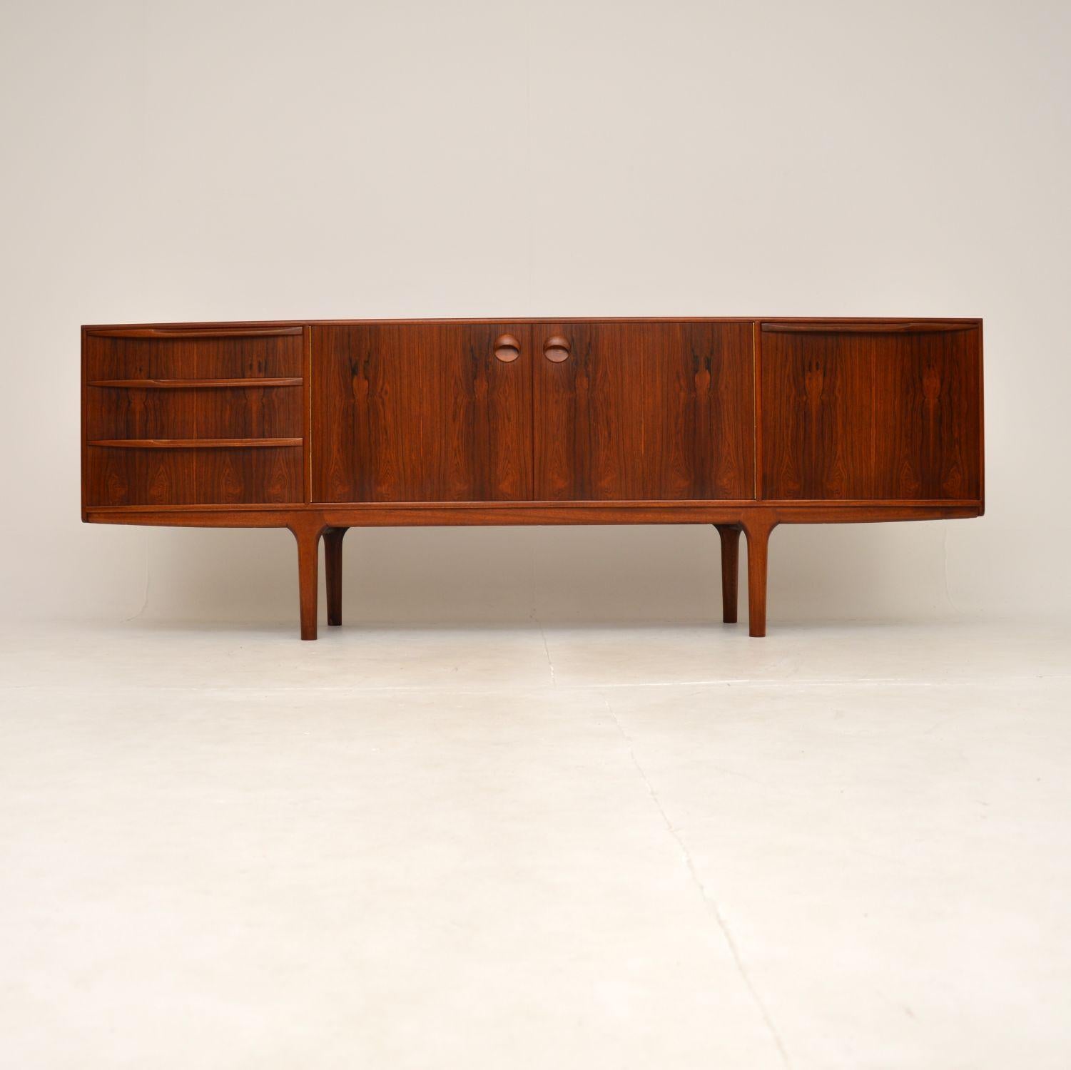 A very stylish and highly sought after vintage sideboard by McIntosh. This model is called the Dunfermline, it was designed by Tom Robertson and made in Scotland in the 1960’s.

It is of superb quality and is beautifully designed, with absolutely