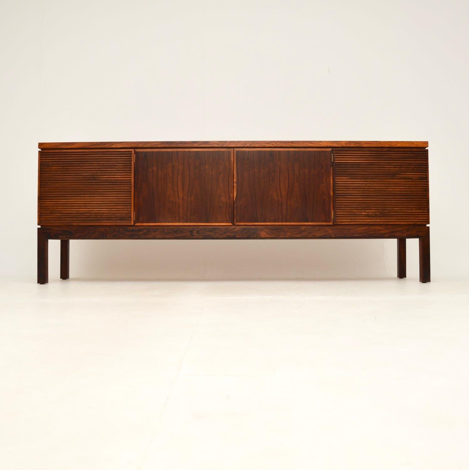 An impressive and extremely beautiful vintage sideboard by Robert Heritage for Archie Shine. This model is called the “Bridgeford” sideboard, it was made in England in the 1960’s.

This is of amazing quality, with many fine features. There are