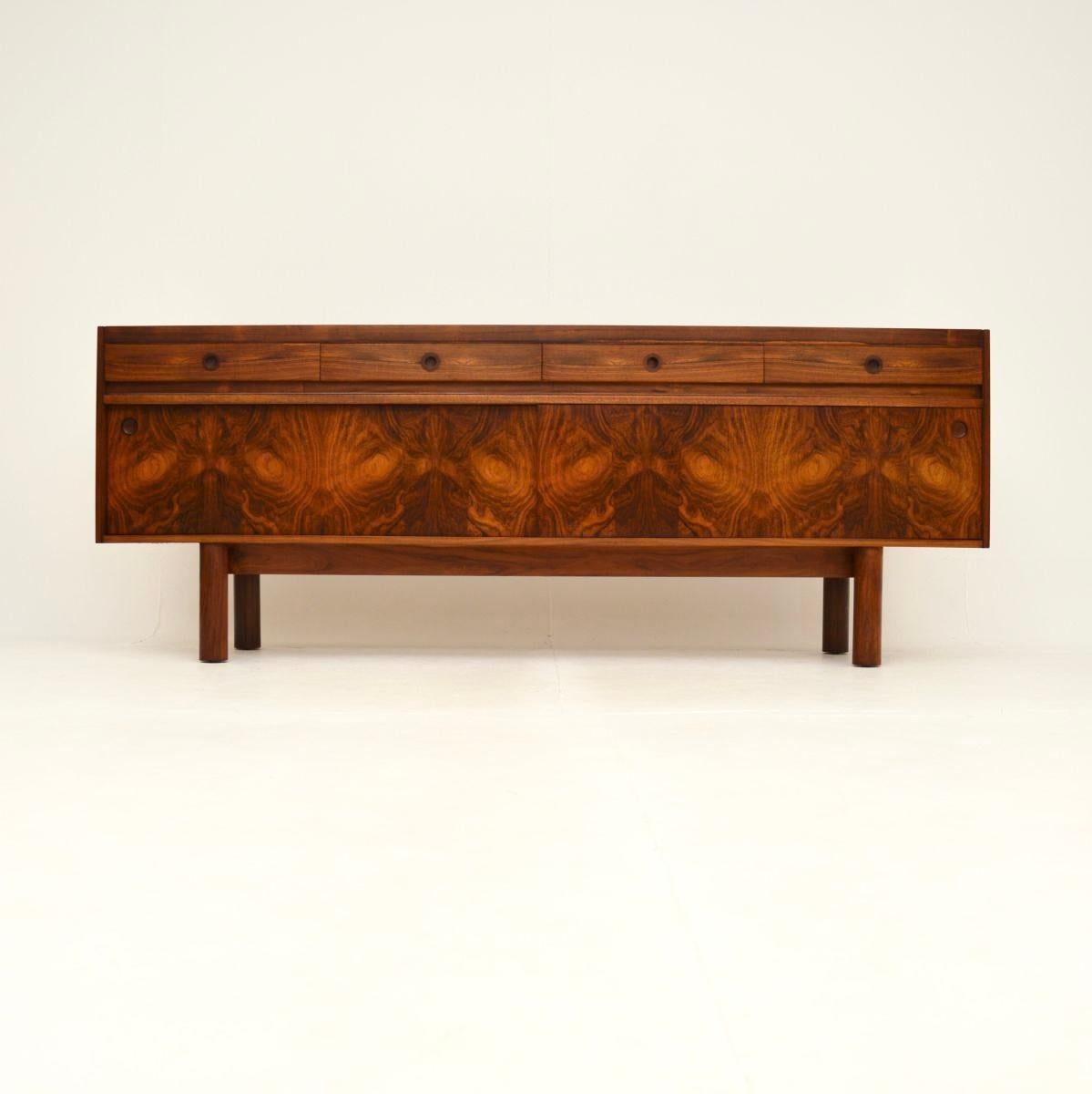 A stunning vintage sideboard by Robert Heritage for Archie Shine. This was made in England and originally retailed by Heal’s, it dates from the 1960’s.

It is of amazing quality, this is one of the finest models, with absolutely gorgeous grain