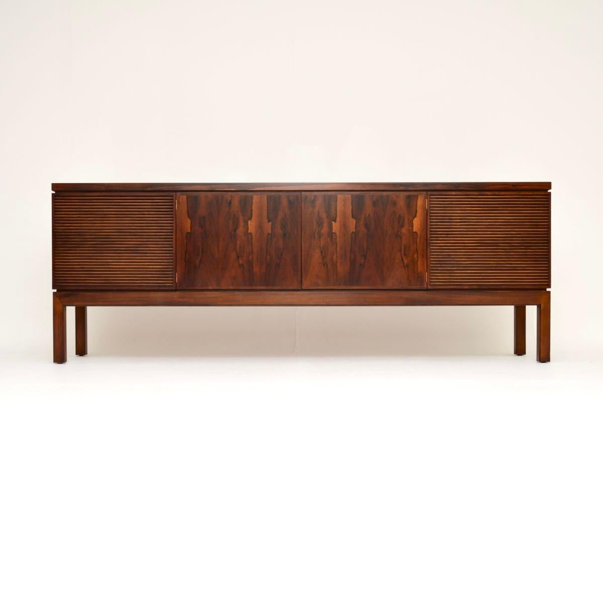 An impressive and extremely beautiful vintage sideboard by Robert Heritage for Archie Shine. This model is called the “Bridgeford” sideboard, it was made in England in the 1960’s.

This is of amazing quality, with many fine features. There are