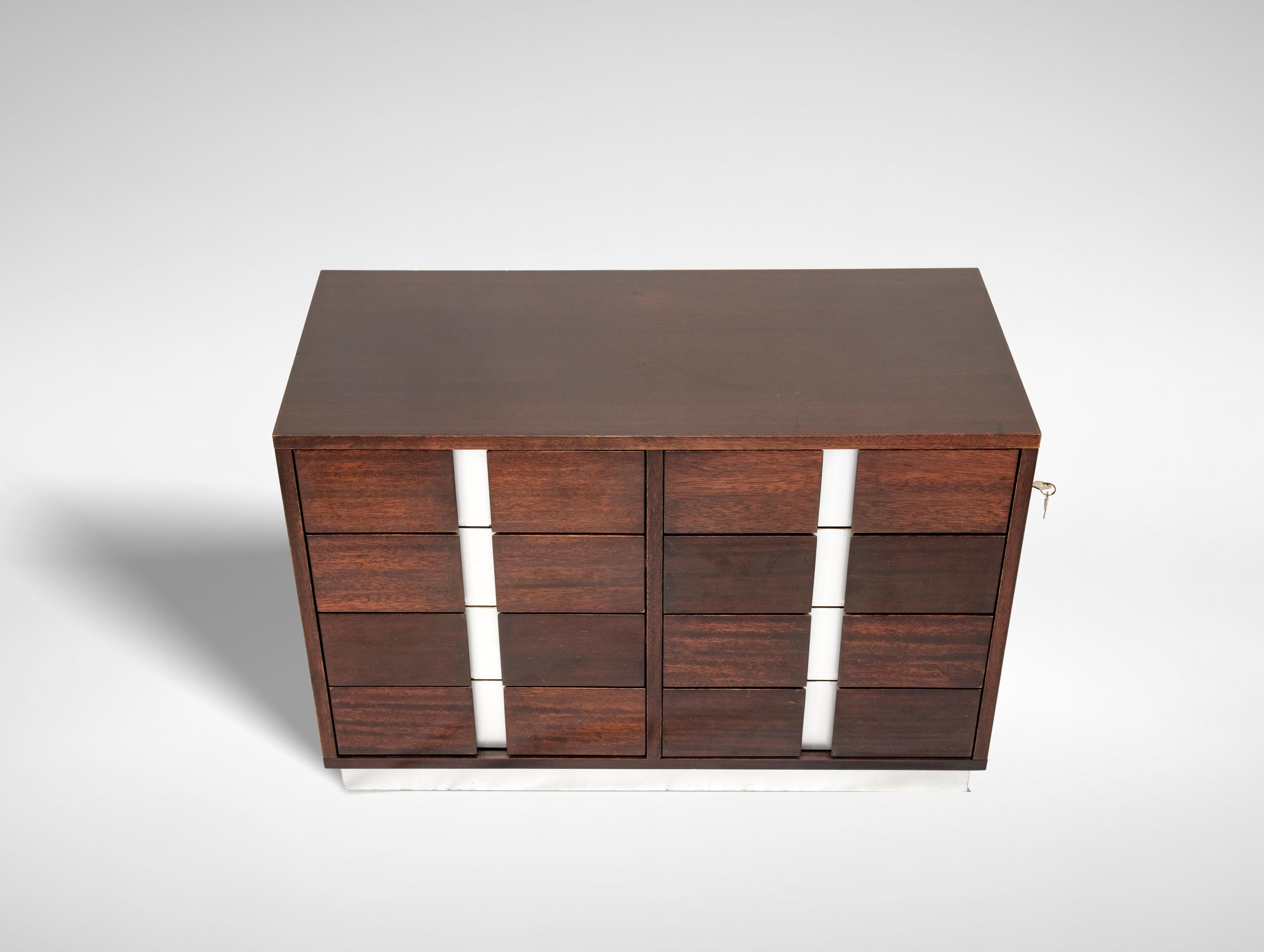 Sideboard of eight drawers realized by Ico Parisi for MIM.
With plywood structure covered in rosewood.
Details in satin aluminium. Signs of use present with rosewood veneered plywood frame.