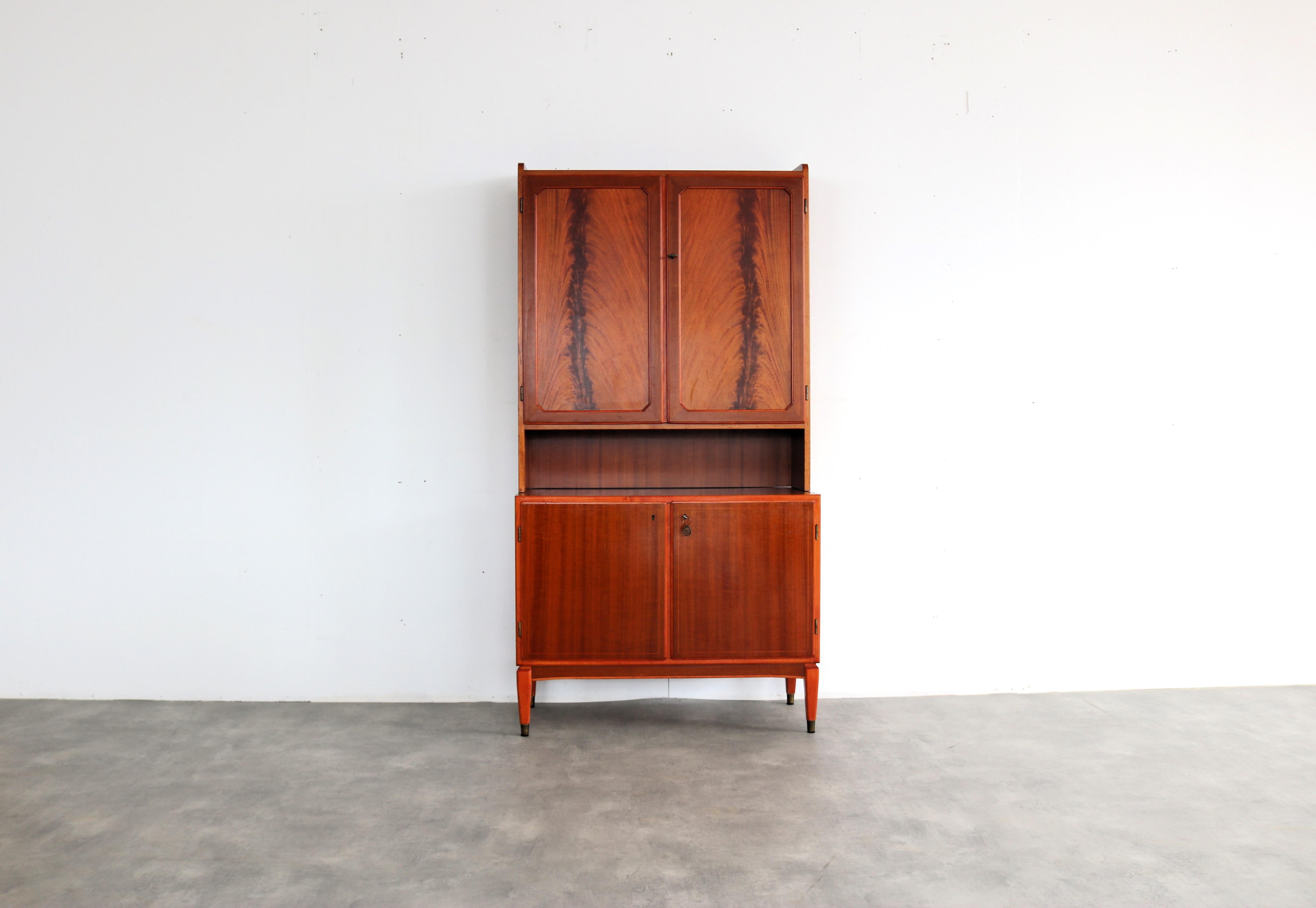 vintage sideboard | wall cupboard | 60s | Sweden

period | 60's
design | unknown | Sweden
condition | good | light signs of use
size | 174 x 90 x 42 (hxwxd)

details | mahogany;

article number | 2131