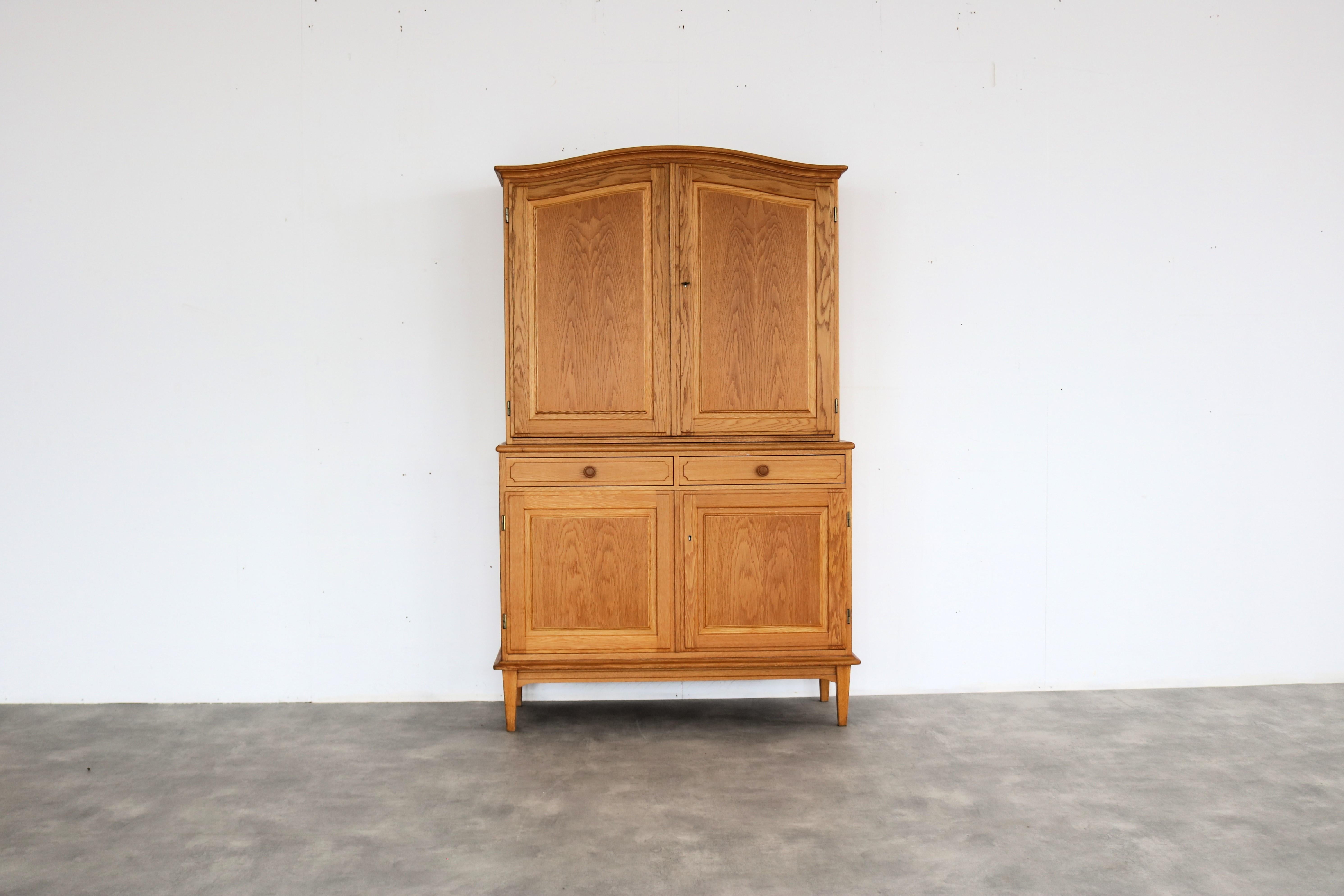 vintage sideboard  wall cupboard  60s  Swedish

period  60's
design  unknown  Sweden
condition  good  light signs of use
size  172 x 108 x 45 (hxwxd)

details  teak; oak;

article number  2284