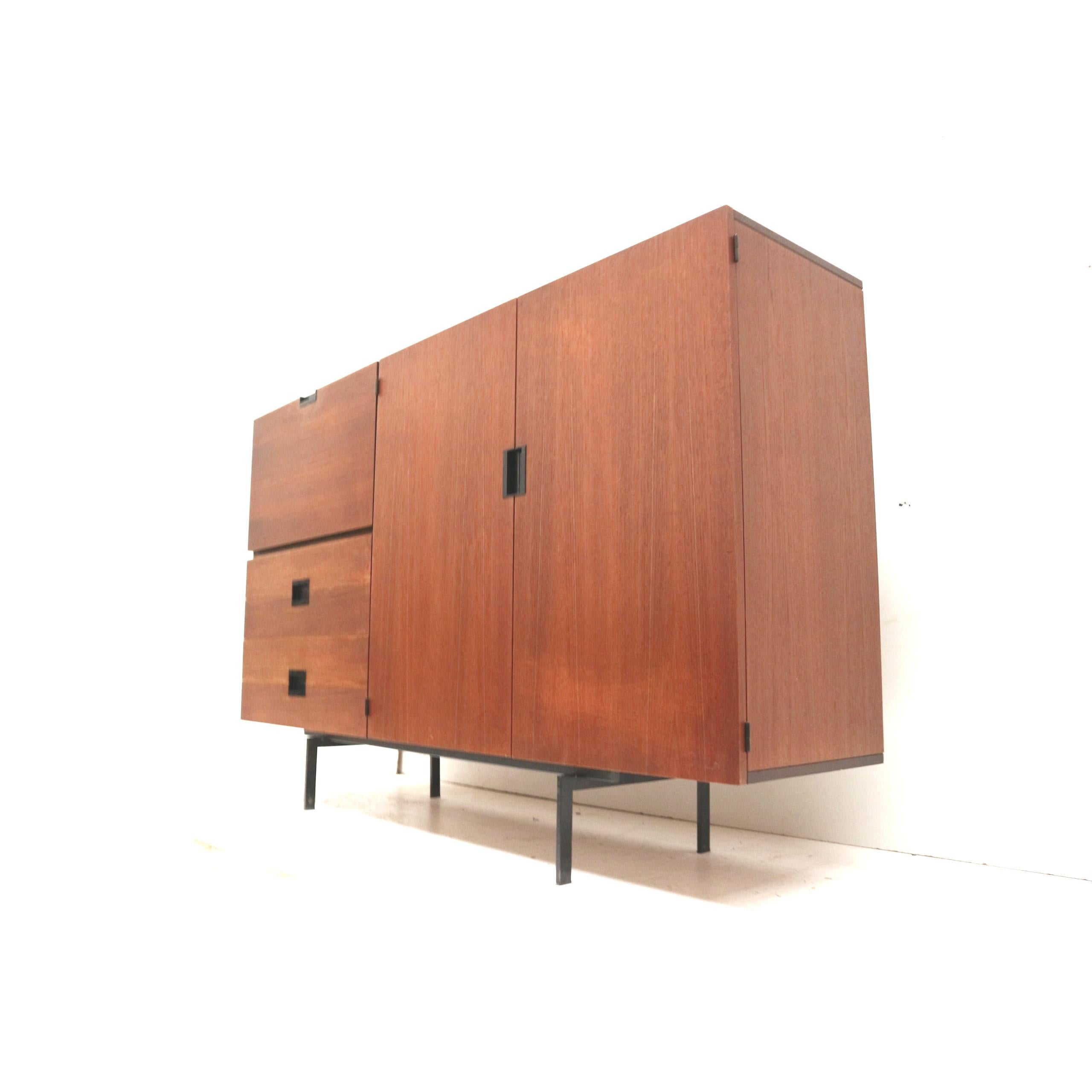 Vintage sideboard / wall unit Model CU09 from the Japanese Series by Cees Braakman from Pastoe from the 1960s.

Dimensions:
Width: 185 cm
Depth: 45 cm
Height: 117 cm

Dimensions compartment right:
Width: 105.5 cm
Depth: 41.5 cm
Height: 91 cm