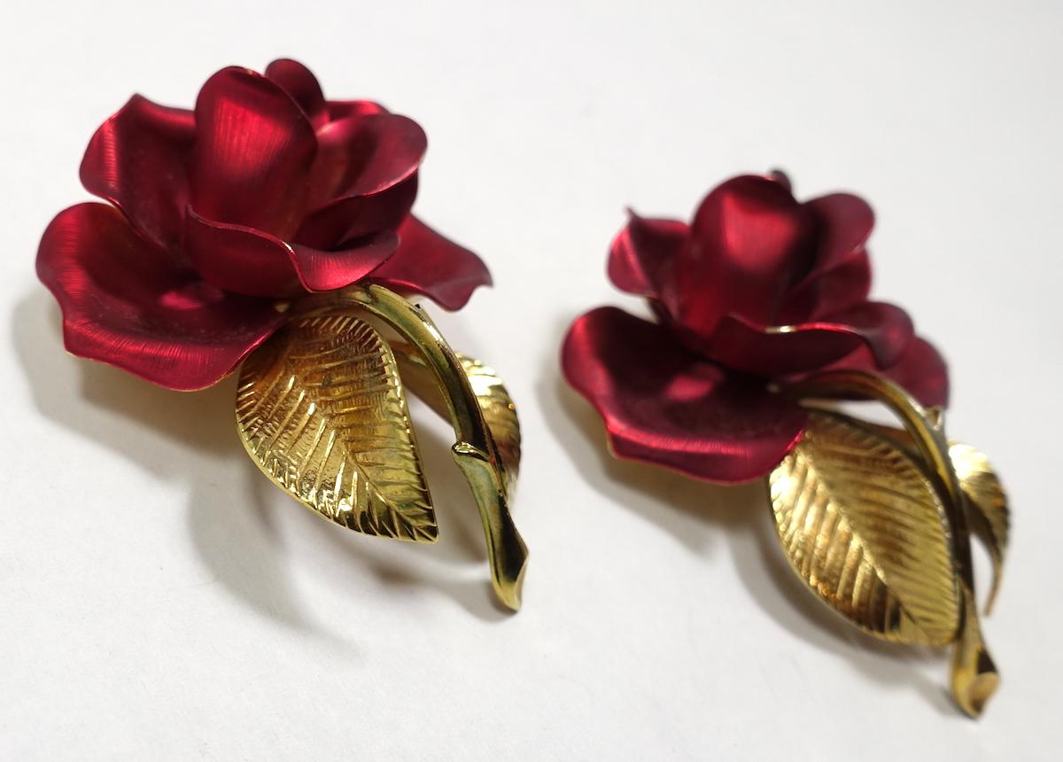 Here are two vintage signed Cerrito brooches with a rose design in red enameling in a gold tone setting.  Each brooch measures 1-7/8” x 1-1/4” and is signed “Cerrito”.  They are in excellent condition.