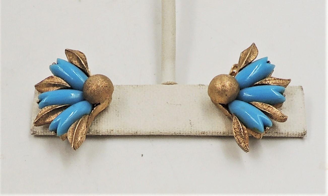 1950s goldtone and faux-turquoise clip back earrings. Marked 