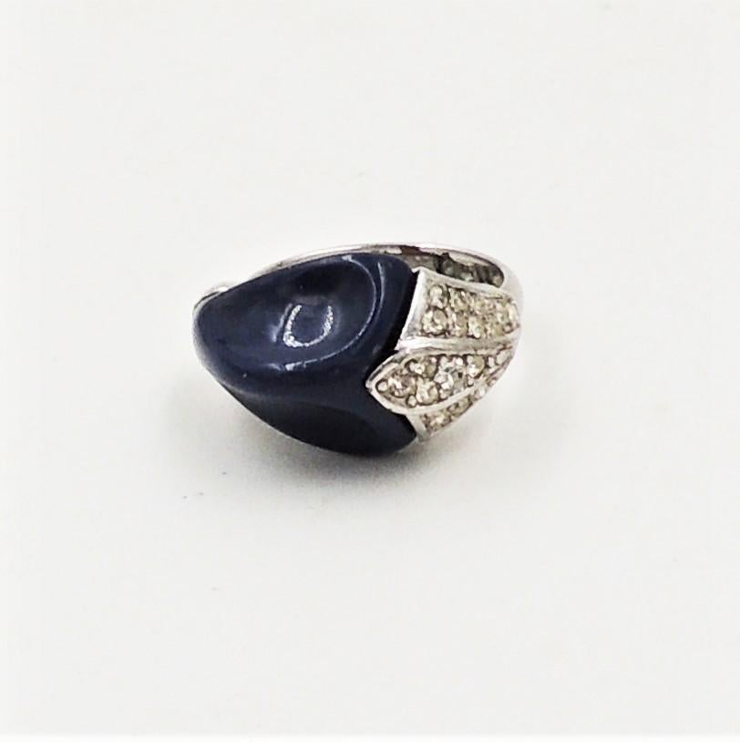 1970s rhodium plated navy blue Lucite and pave clear rhinestone size 6 1/2 ring. Marked 