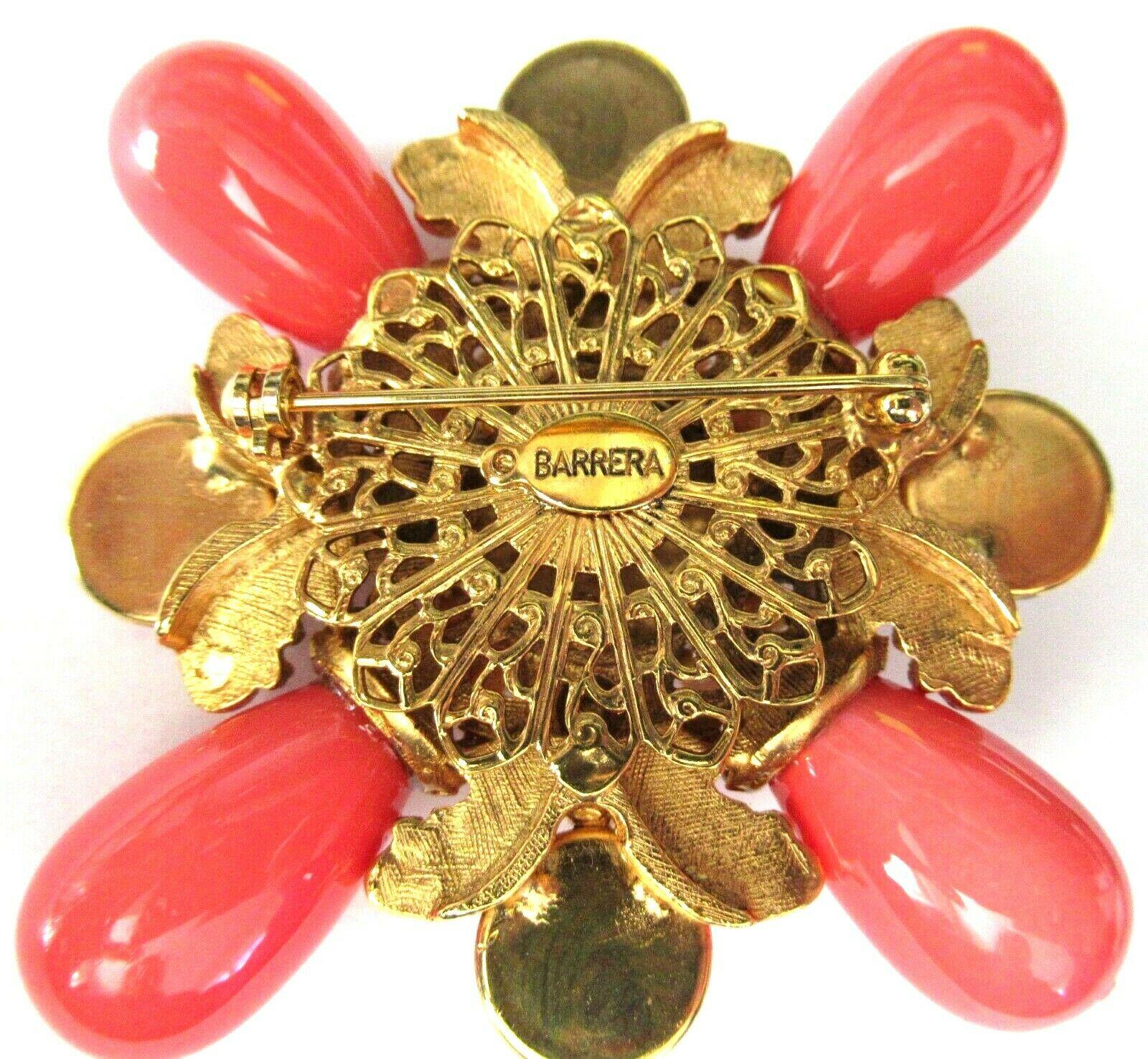 Signed Designer Barrera Statement Faux Coral Cross Brooch. Hand set with cabochon Faux Coral and accented by pearls. Measuring approx. 3” More Beautiful in real time...Chic and sure to be admired complement to your outfit! 
