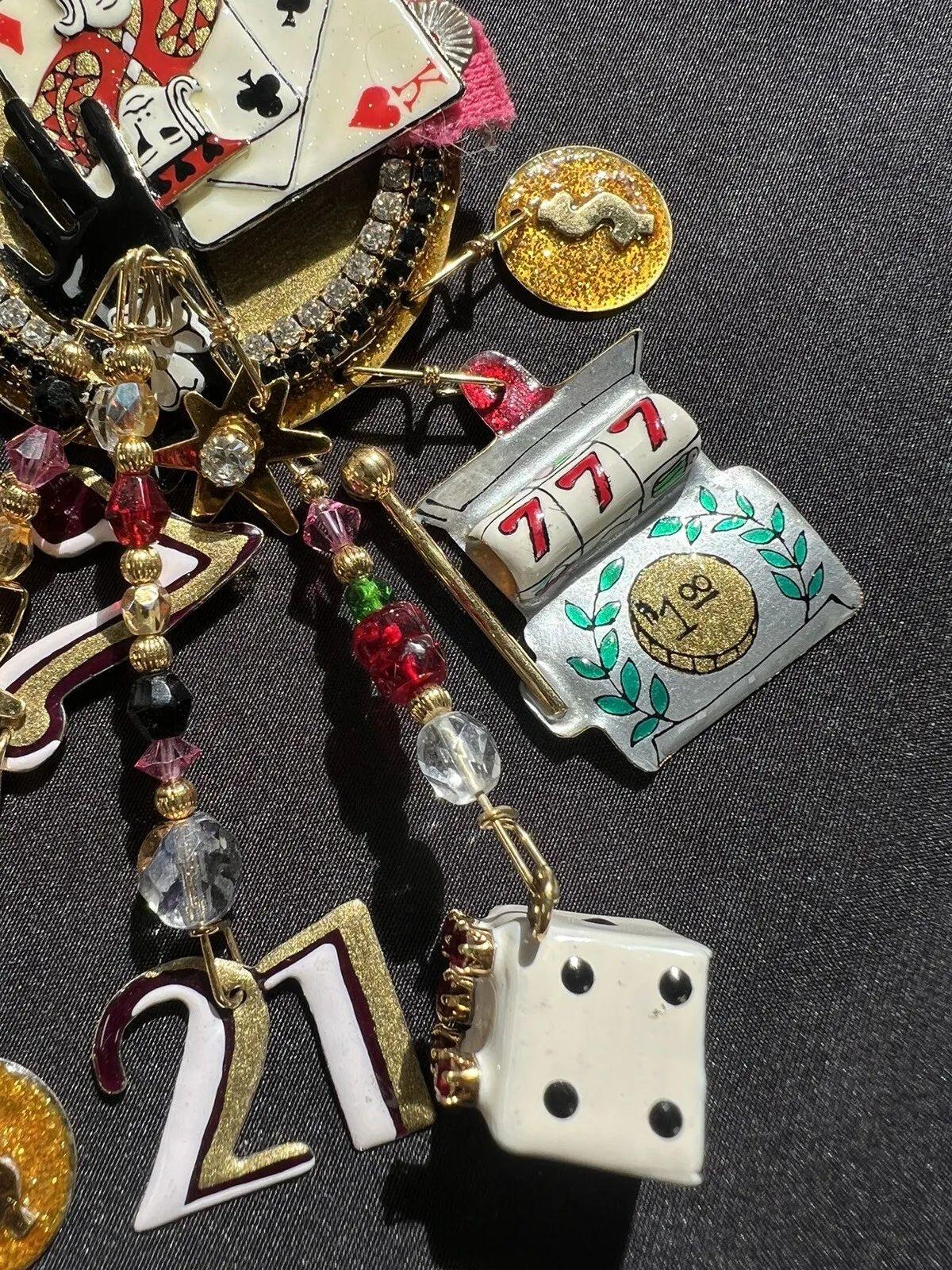 Modernist Vintage Signed Designer LUNCH at The RITZ Multi Charm Las Vegas Gaming Brooch For Sale