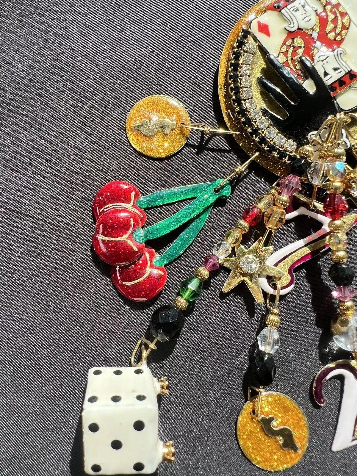 Mixed Cut Vintage Signed Designer LUNCH at The RITZ Multi Charm Las Vegas Gaming Brooch For Sale