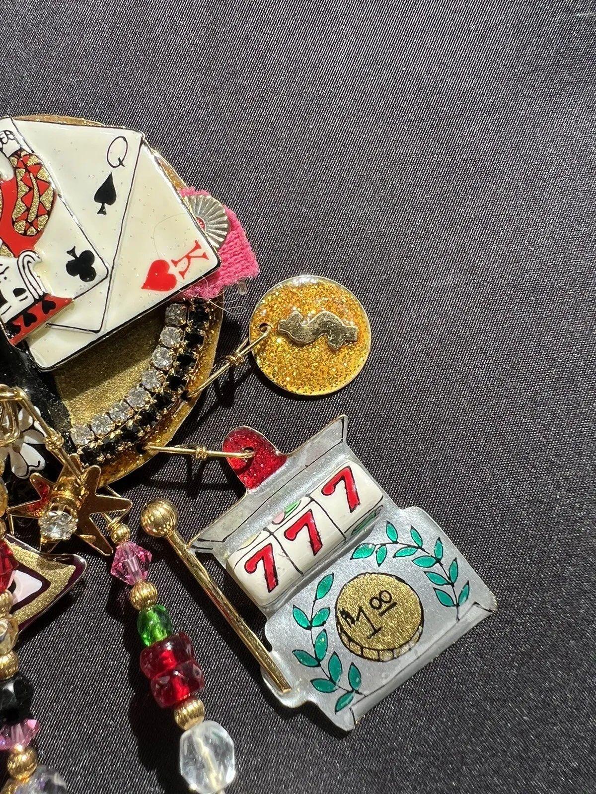 Vintage Signed Designer LUNCH at The RITZ Multi Charm Las Vegas Gaming Brooch In Excellent Condition For Sale In Montreal, QC