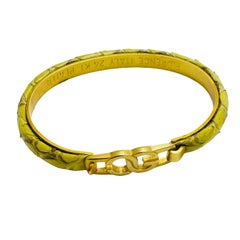 Bracelet jonc vintage signé FLORENCE, Italie, plaqué or 24 carats en peau de serpent