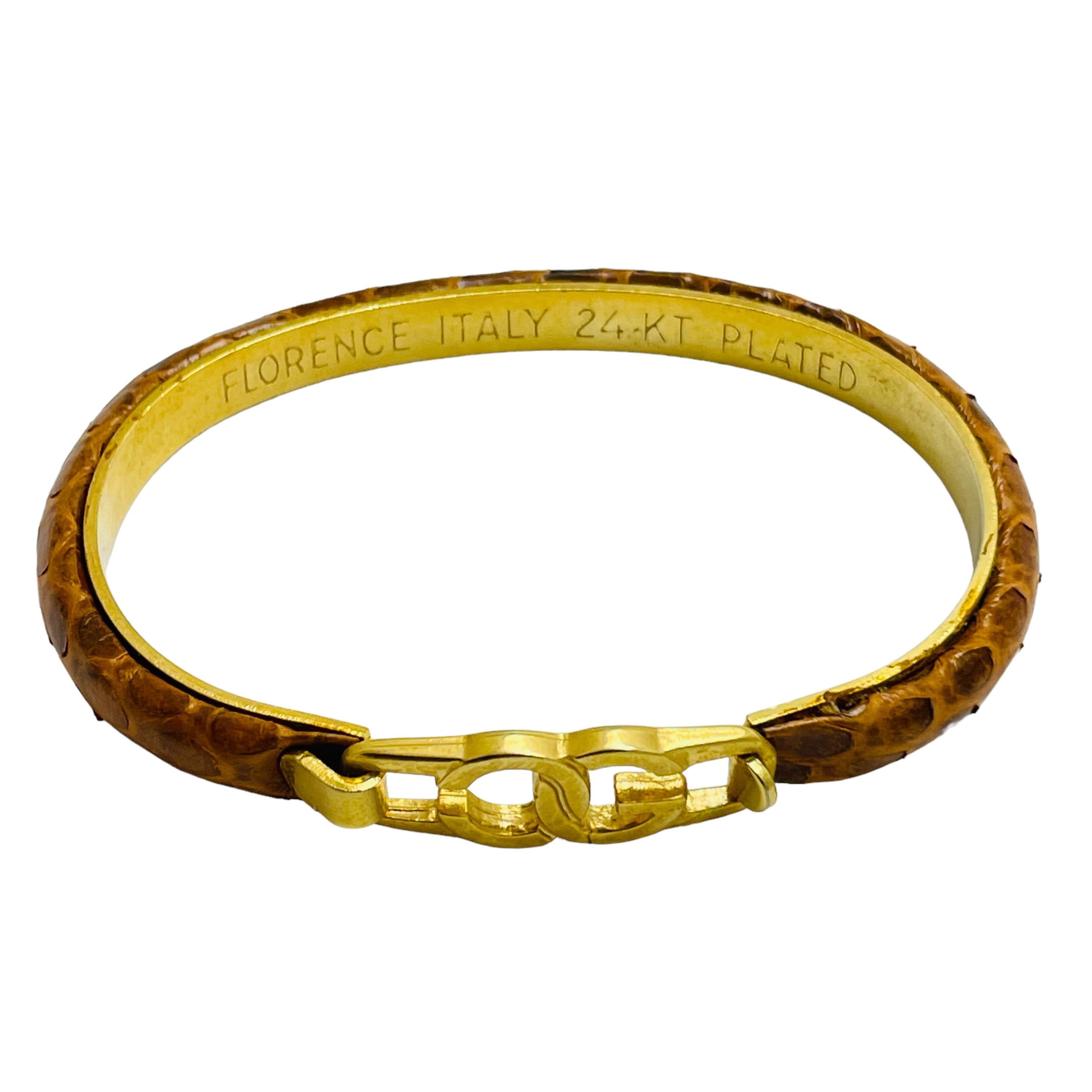 DETAILS

• signed FLORENCE Italy 24k plated   

• gold tone snake skin

• vintage designer bracelet

MEASUREMENTS  

• will fit wrist up to size 7”

CONDITION

•  very good vintage condition with minimal signs of wear 

 Sku 43

❤️❤️  VINTAGE