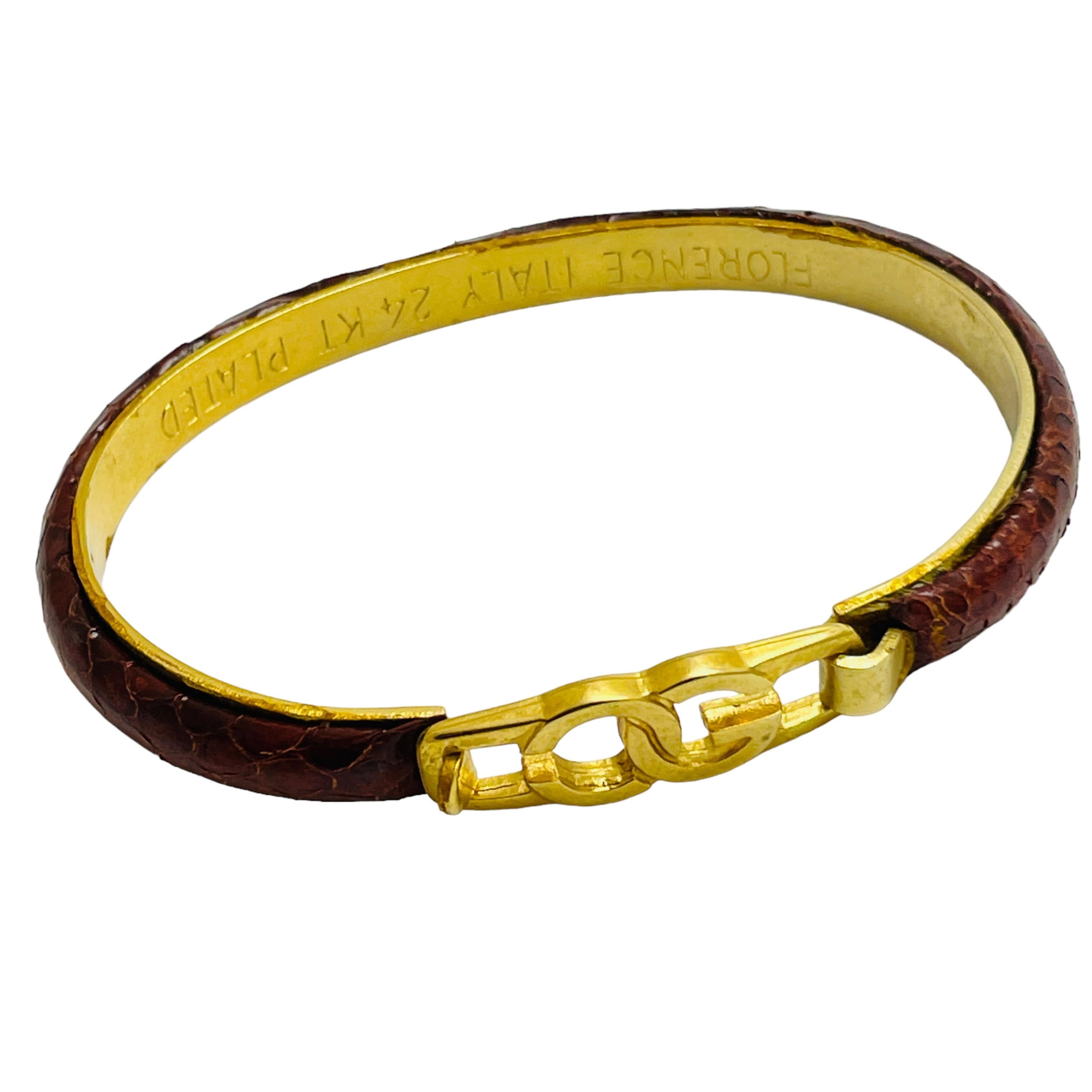 DETAILS

• signed FLORENCE Italy 24k plated   

• gold tone snake skin

• vintage designer bracelet

MEASUREMENTS  

• will fit wrist up to size 7”

CONDITION

•  very good vintage condition with minimal signs of wear 

 Sku 43

❤️❤️  VINTAGE