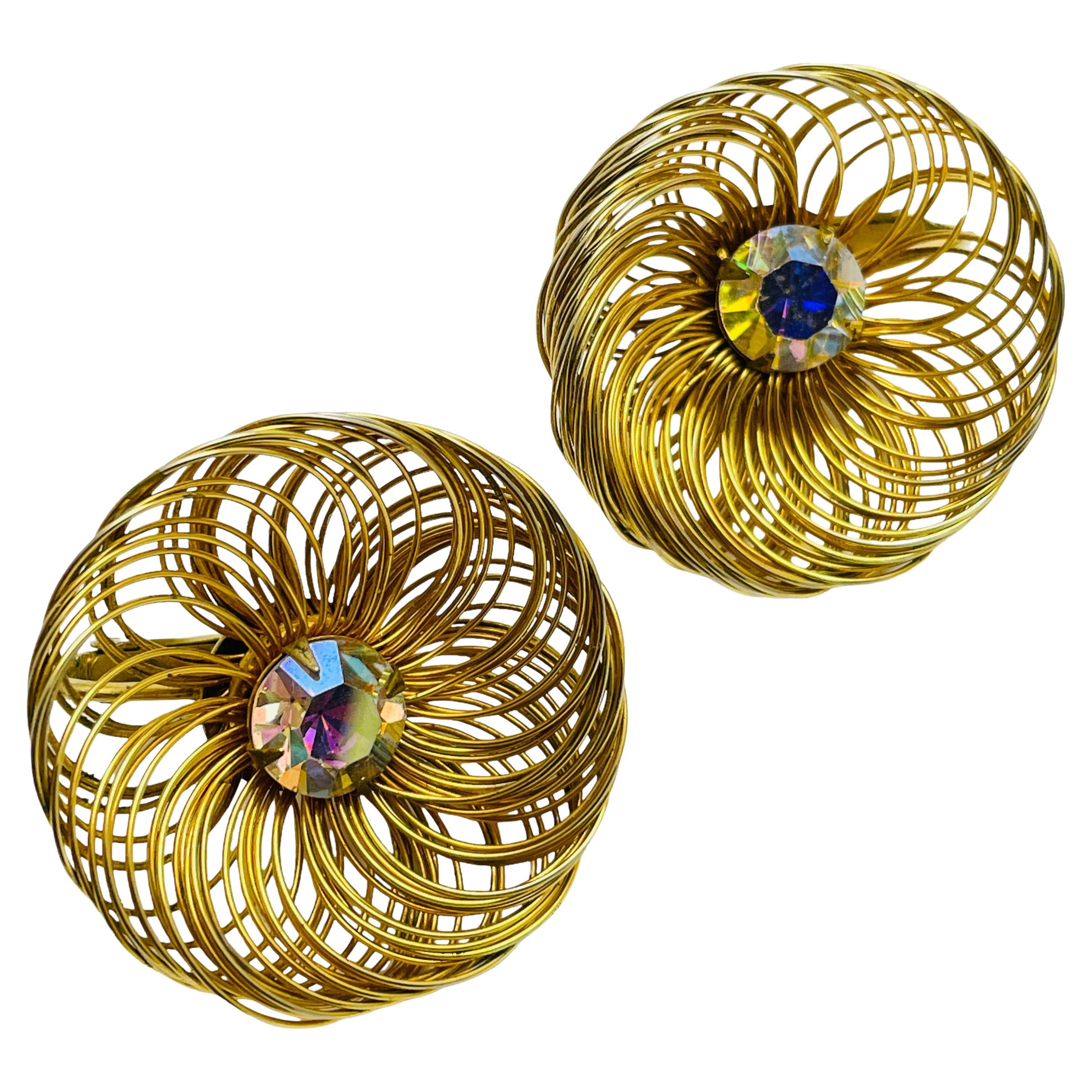 Vintage signed gold rhinestone designer clip on earrings For Sale