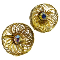 Boucles d'oreilles à clip vintage signées avec strass et or