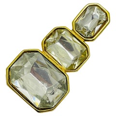 Spilla vintage firmata in vetro color oro