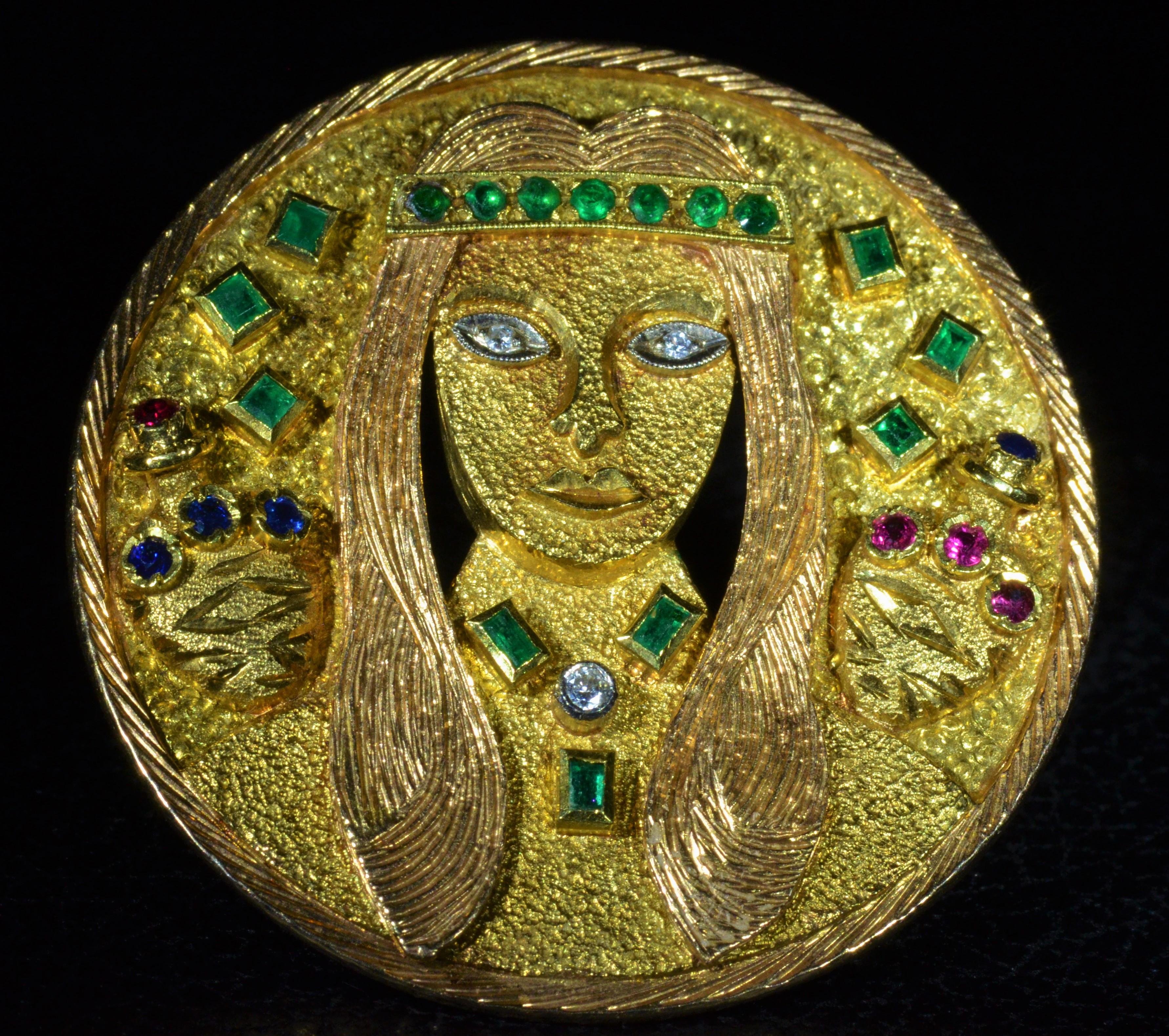 Vintage Signed Goldman Kolber Custom Inca or Mayan lady Pendant Brooch Combination.  The pendant is set with Colombian emeralds, vivid rubies, and sapphires.  The pendant depicts a woman with diamond eyes wearing Colombian emerald headband with