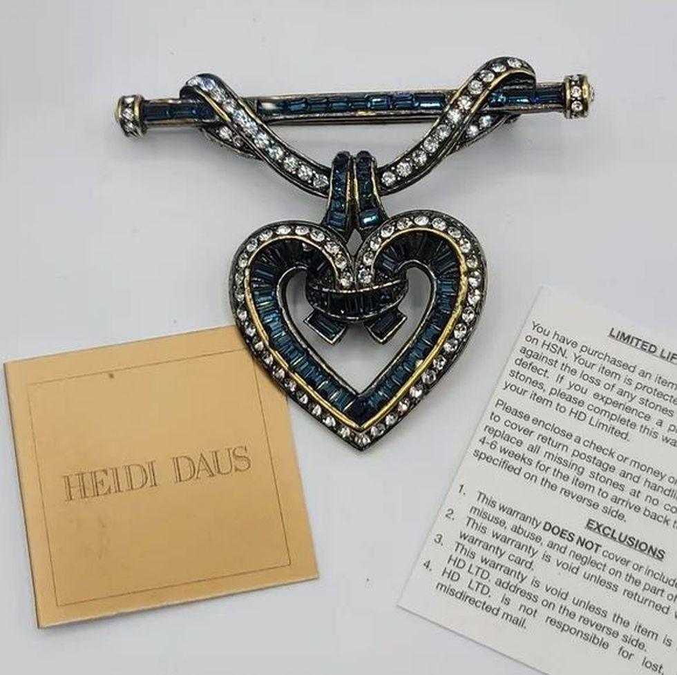 Vintage Heidi Daus Signed Designer Sparkling Crystal Heart Brooch Pin NIB. Simply Beautiful! Signed Heidi Daus Designer Heart Brooch encrusted with Hand set Sparkling Blue and White Crystals. Express your love for that special someone with this