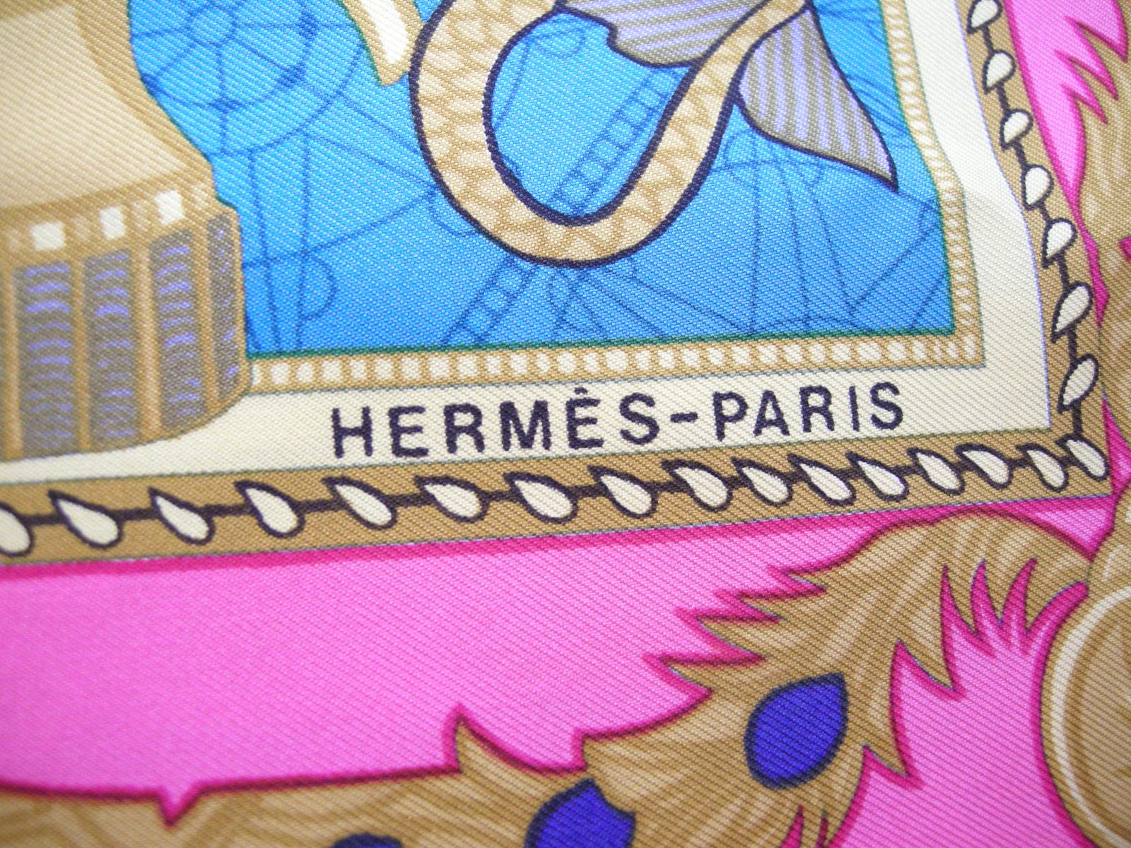 This vintage signed Hermes silk scarf is from the  