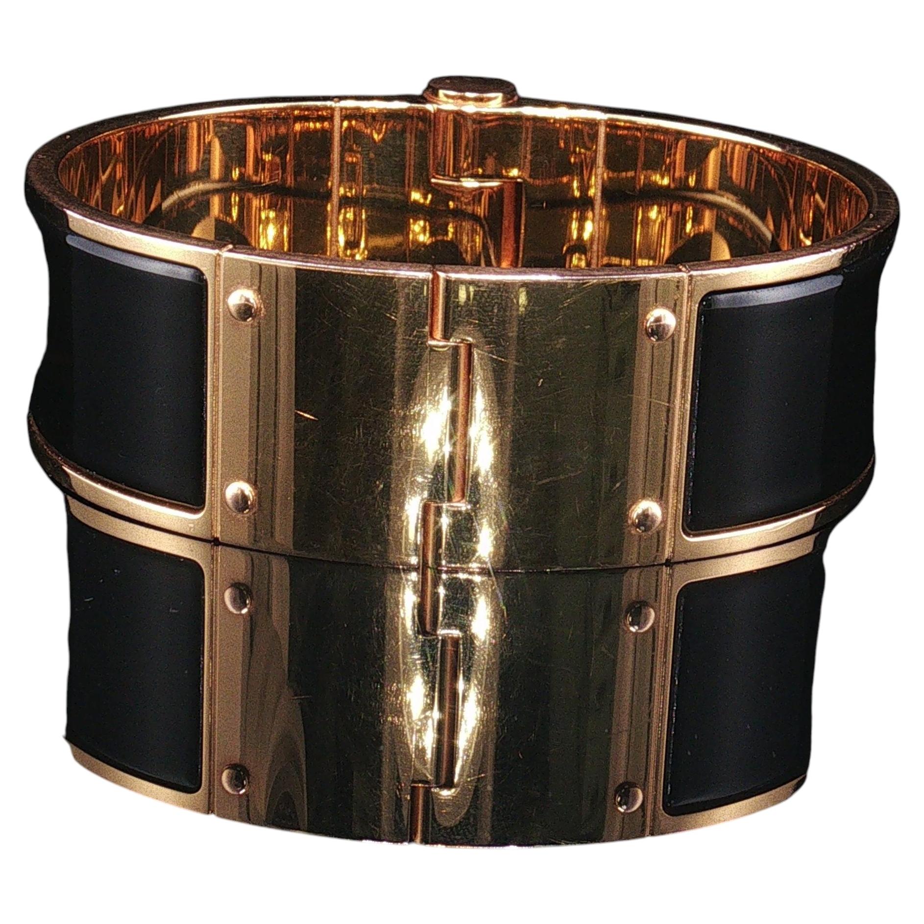 How do I open my Hermès H bracelet?
