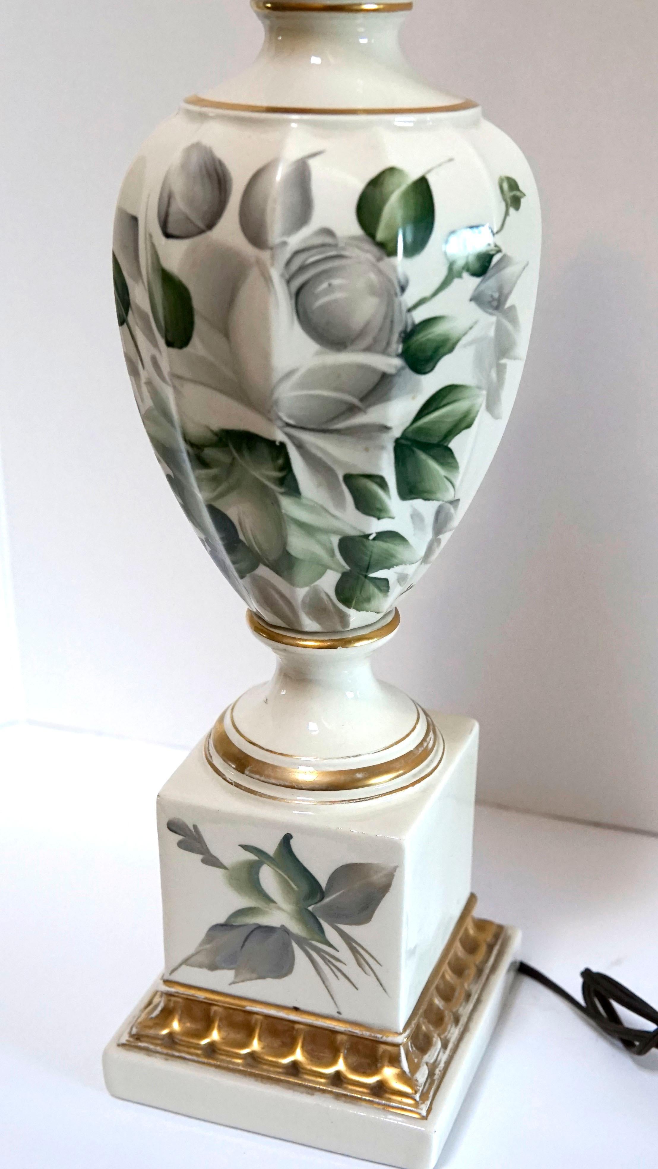 This lamp is so special, so elegant and hard to find. The palette is attractive in ivory with leaves in various shades of green and gray that appear to be falling on this vintage botanical hand-painted porcelain vasiform table lamp. This is