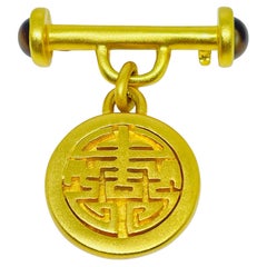 Vintage signed matte gold tone Asian glass cabochon dangle designer brooch