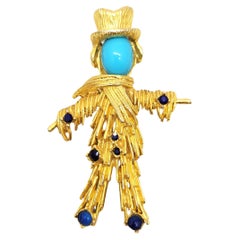 Vintage Signed Pauline Rader Goldtone Faux-Turquoise Lapis Scarecrow Brooch