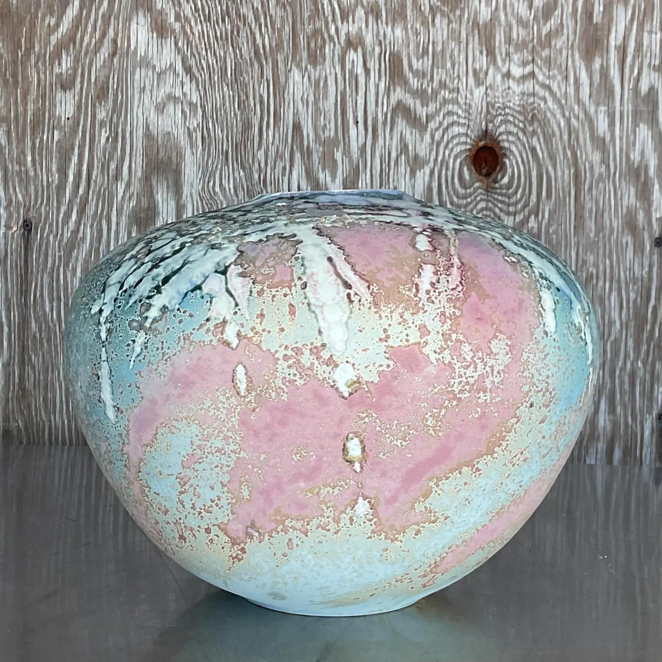 A gorgeous vintage Tony Evans ceramic pottery seed pot in pastel colors and it is signed at the bottom of the pot. Acquired at a Palm Beach estate