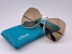 Occhiali da sole vintage Silhouette 668 Oversize con lenti marroni e argento degli anni '70