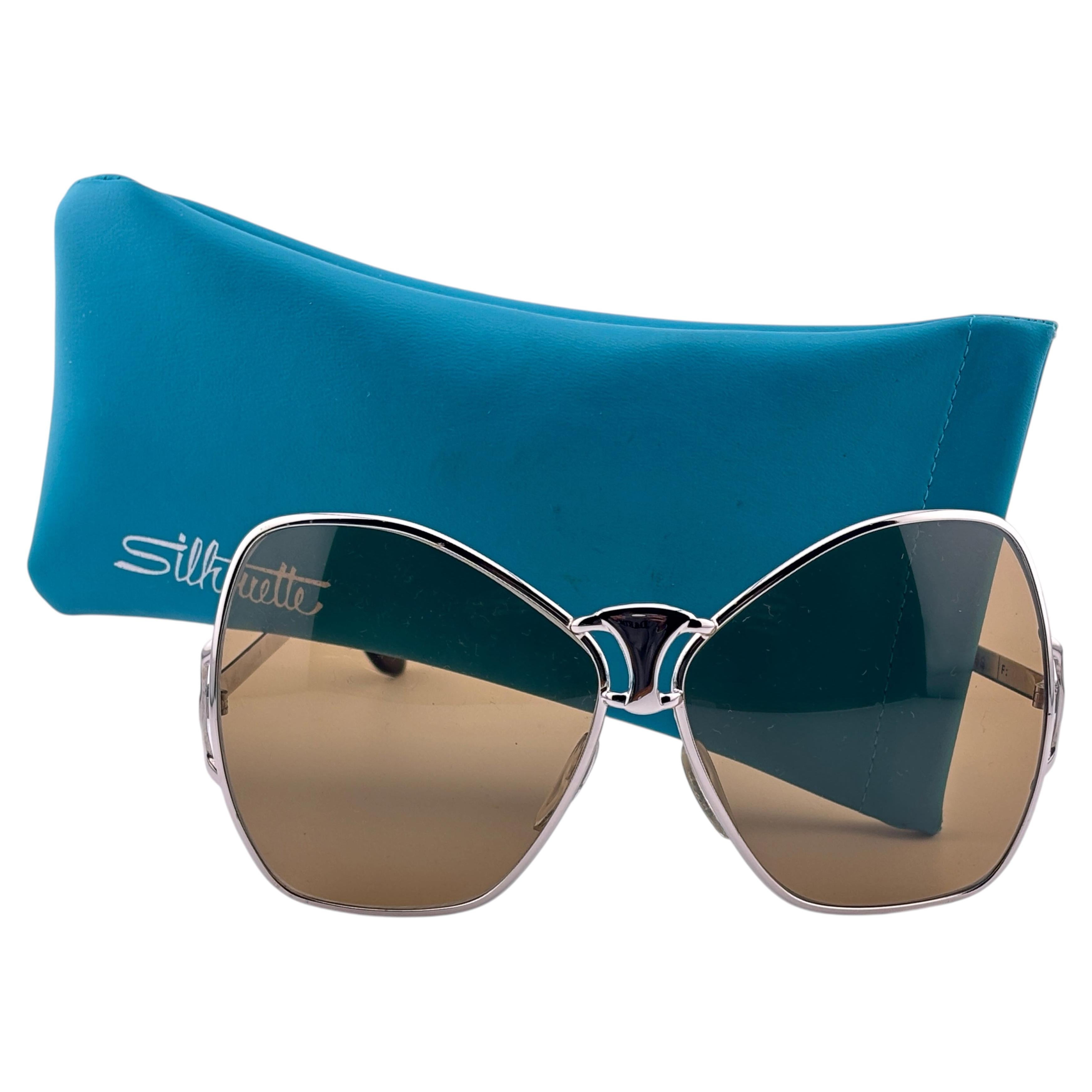 Gafas de sol vintage Silhouette 668 sobredimensionadas con lentes marrones plateadas de los años 70