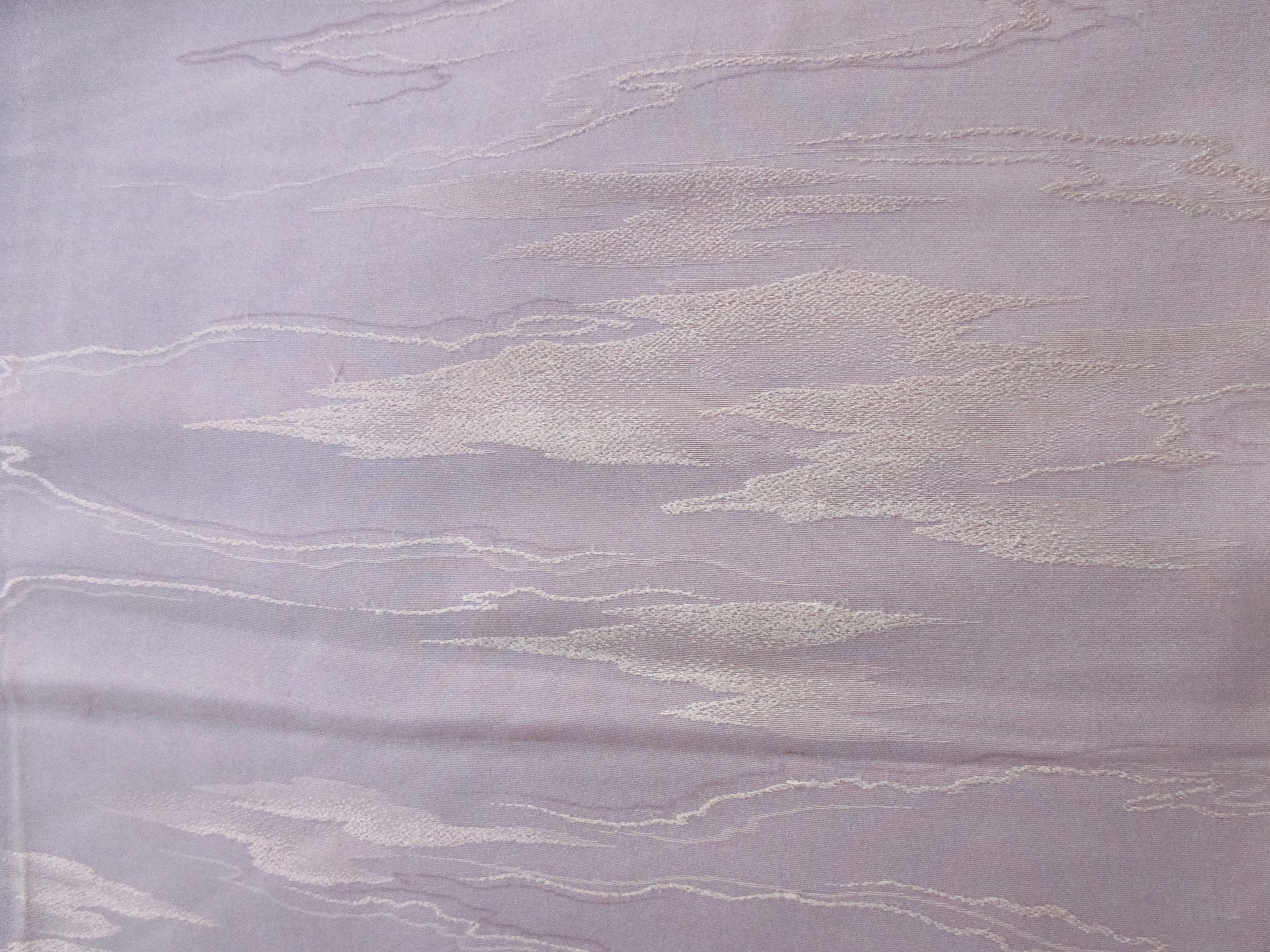 Vintage silk obi textile with tone-on-tone lilac clouds.
Drapes great (not stiff fabric)
Over all woven pattern.
Ideal for pillows.
Size: 13.5