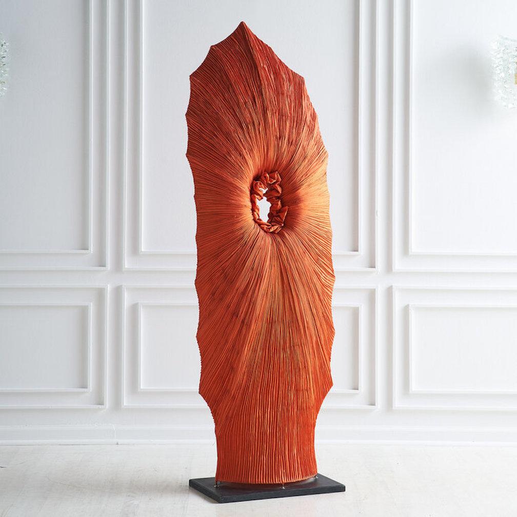 A vintage silk floor sculpture sourced in Italy; possibly an early production of Aqua Creations or an artist made piece. Mounted to an iron base. Gorgeous deep coral hued silk is gathered and ruched around an iron frame to create an enigmatic and