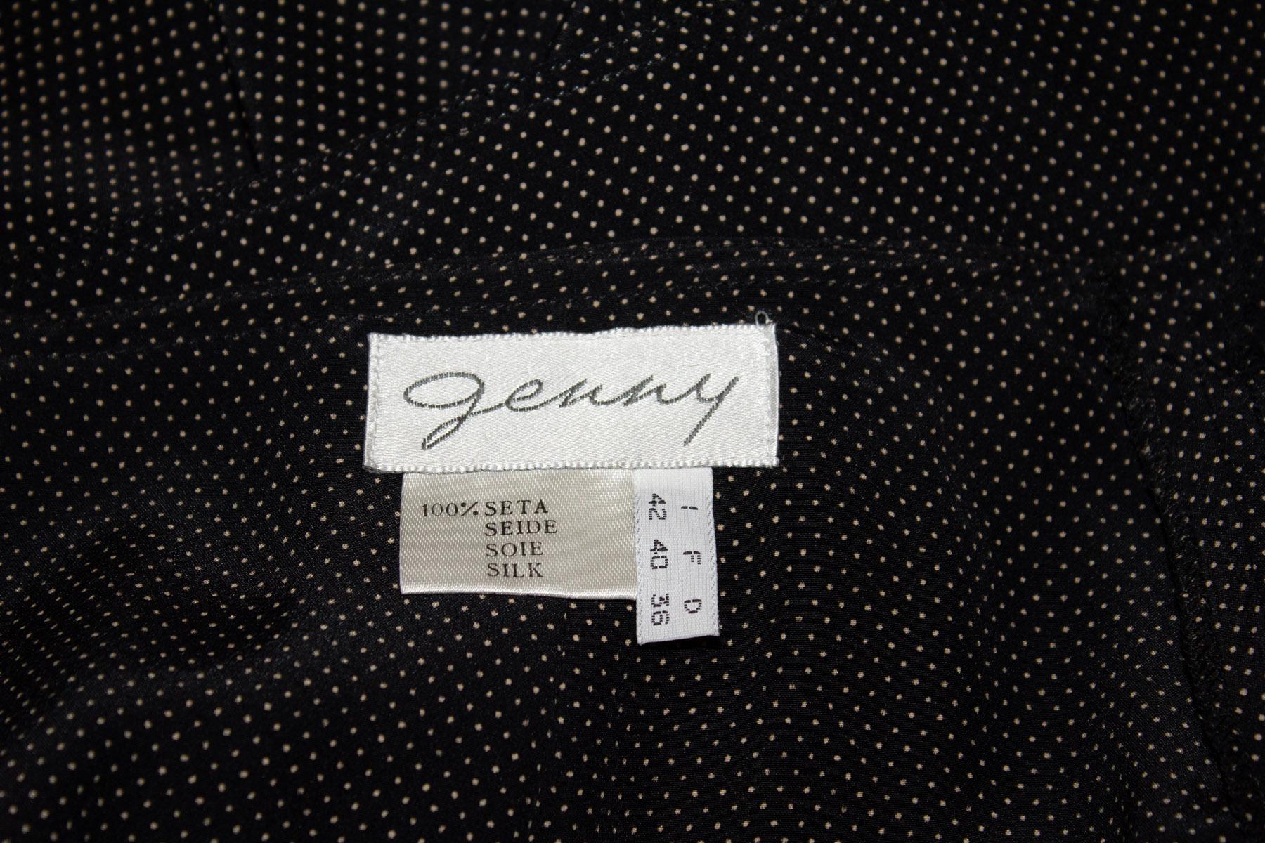 A great vintage silk skirt by Genny.  The skirt is in black with white spots.  It has a top over layer with gathering underneath, it is unlined, and has a back central zip.
Size Italian 42 , GB 34 French 40 Measurements;
Waist 27'', length 30''
