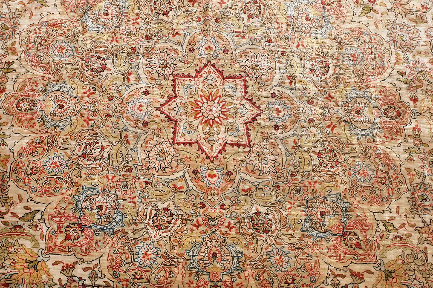 Vintage Silk Turkish Hereke Rug, Country of Origin: Turkey, Circa Date: Second Half of the 20th Century. Size: 8 ft 3 in x 11 ft 10 in (2.51 m x 3.61 m)

Here is a beautiful vintage carpet a silk Hereke carpet that was woven in Turkey during the