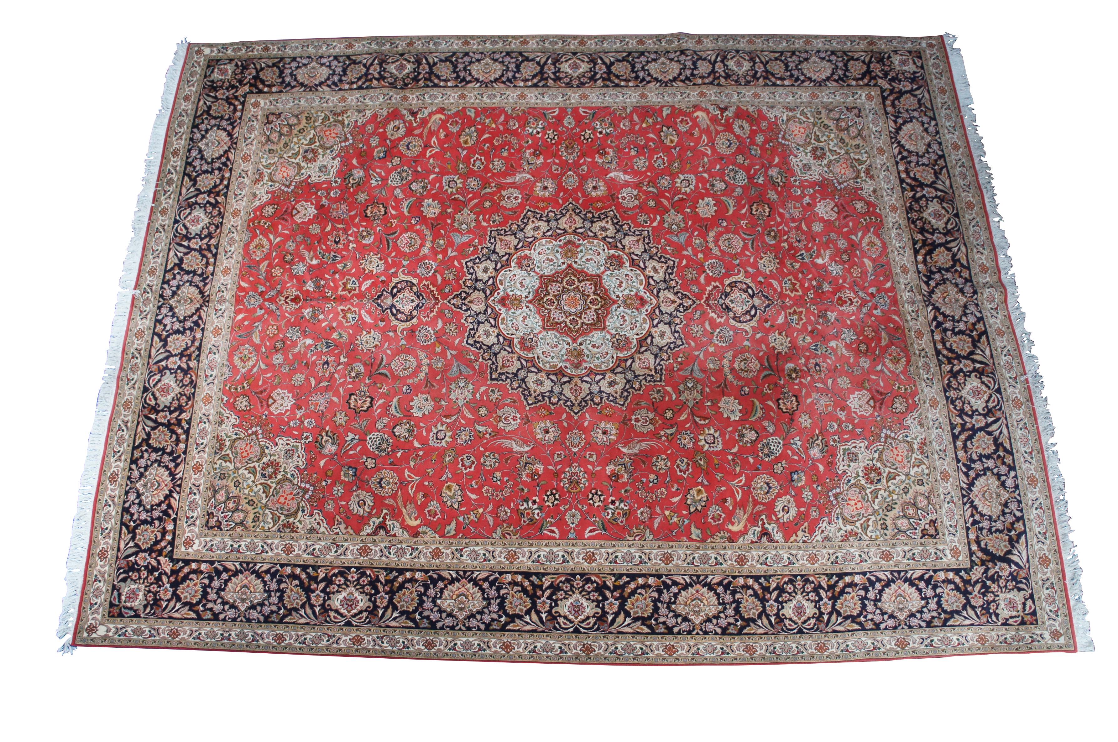 Very high quality vintage hand knotted Persian Tabriz.  Features silk and wool pile featuring a red field with central medallion and floral all over design with birds.  Reds, Blues, Tans, Creme, Pink, Greens, Yellows, Orange, Browns

Appraised in