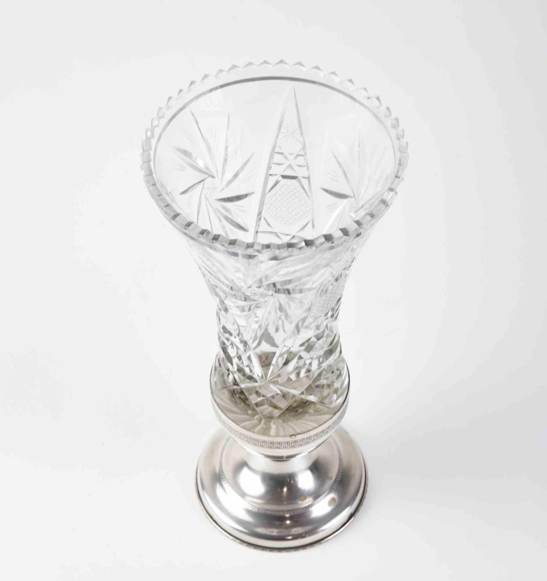 Elegant Silver and Glass and Cristal realized by Italian manufacture in the mid-20th Century.

Some minor stains, otherwise very good condition.

