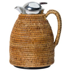 Vintage Silver and Tightly Woven Wicker Water Pitcher