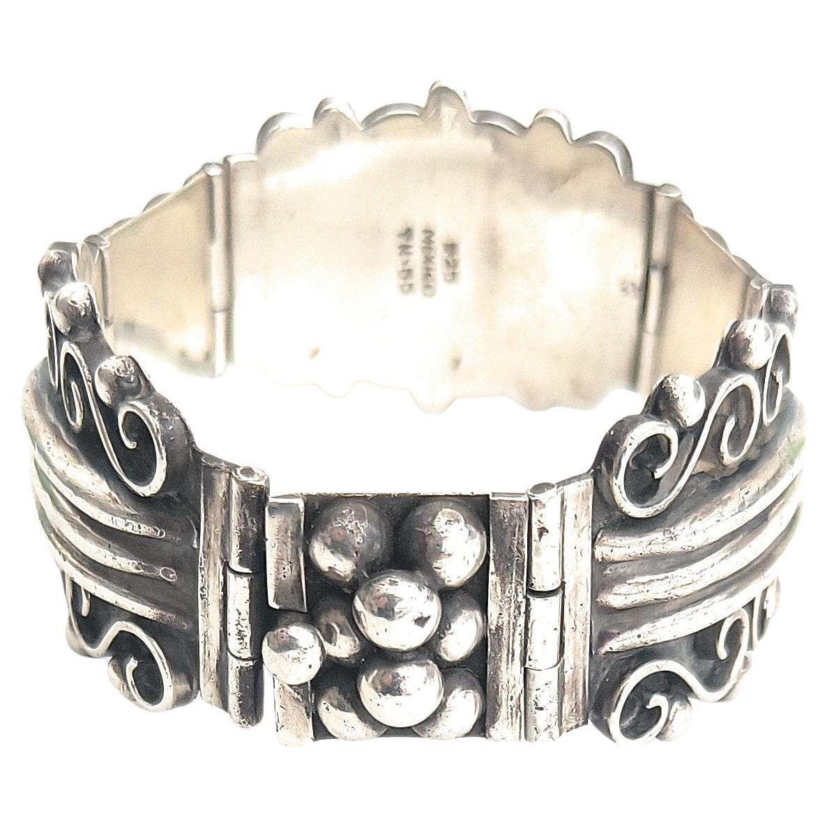 Bracciale d'argento vintage con disegno azteco Taxco Mexico in vendita