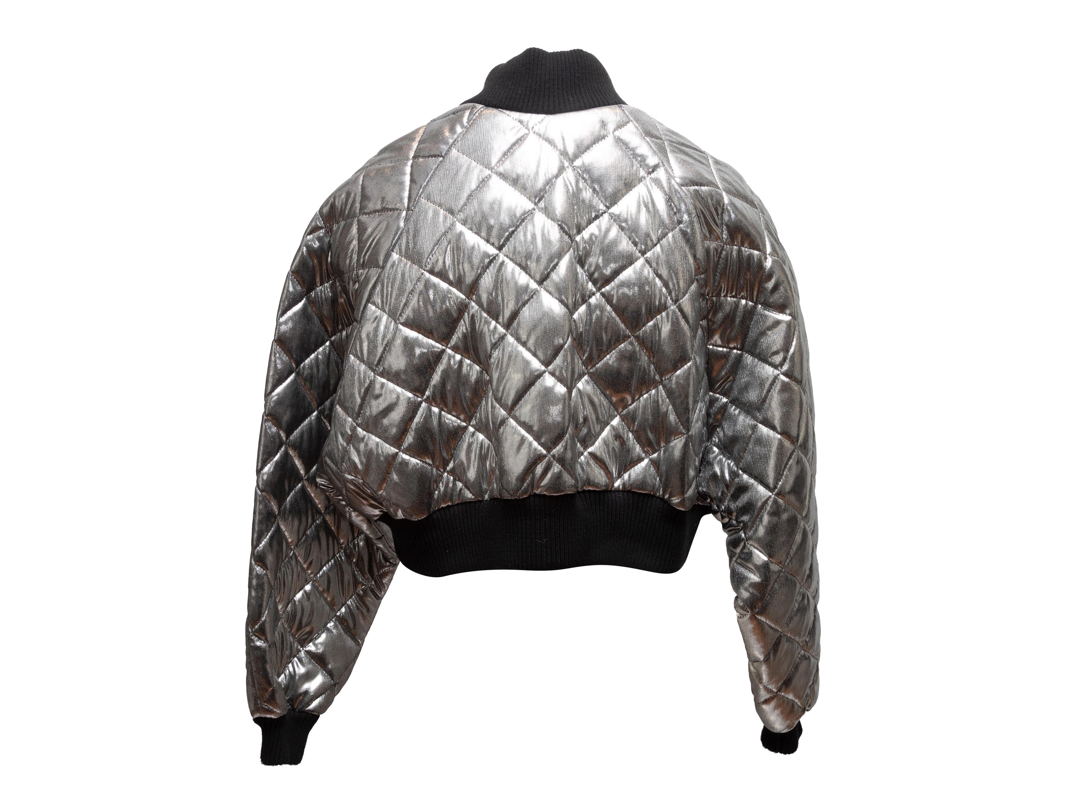 Vintage metallic silver and black quilted cropped bomber jacket by Betsey Johnson Punk Label. Circa 1980s. Snap front closures. 34