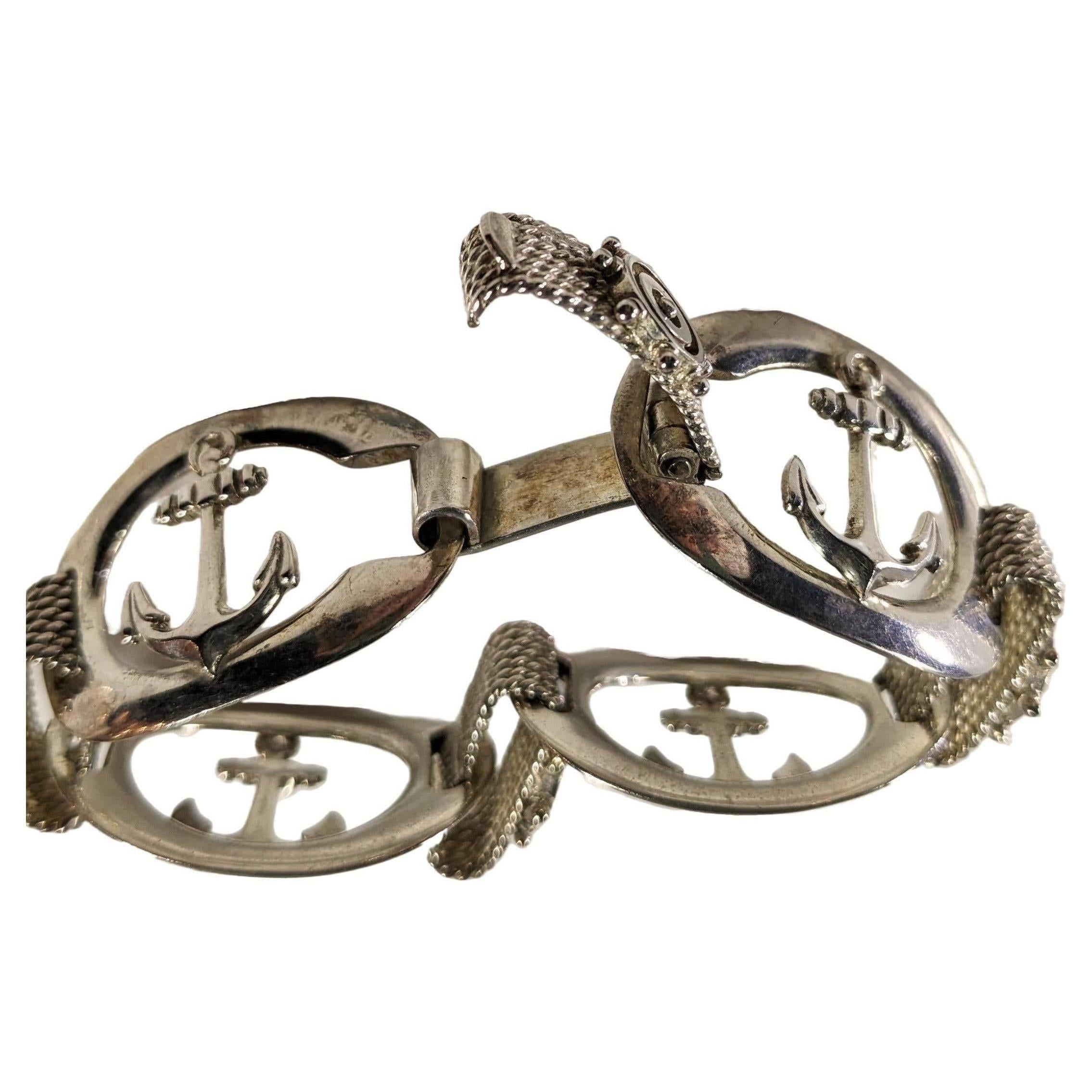 Vintage Silver Bracelet with Nautical Motifs  (Rudders and Anchors)
 It measures 20 cm (7,87 inches) in length and has a safety closure. It weighs  41 grams.

READY TO SHIP
*Shipment of this piece is not affected by COVID-19. Orders