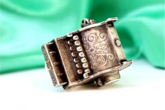 Vintage silver cash register with reliefs and drawer with opening button