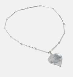 Vintage silver chain with leaf shaped silver pendant. Made 1971.