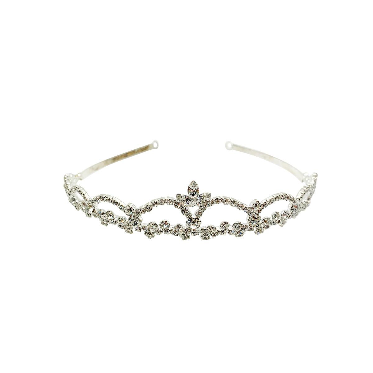 A very pretty vintage arch tiara. Enjoy the age-old tradition on your wedding day with this emblem that signifies the crowning of love.

Vintage Condition: Very good without damage or noteworthy wear.
Materials: silver plated metal, glass