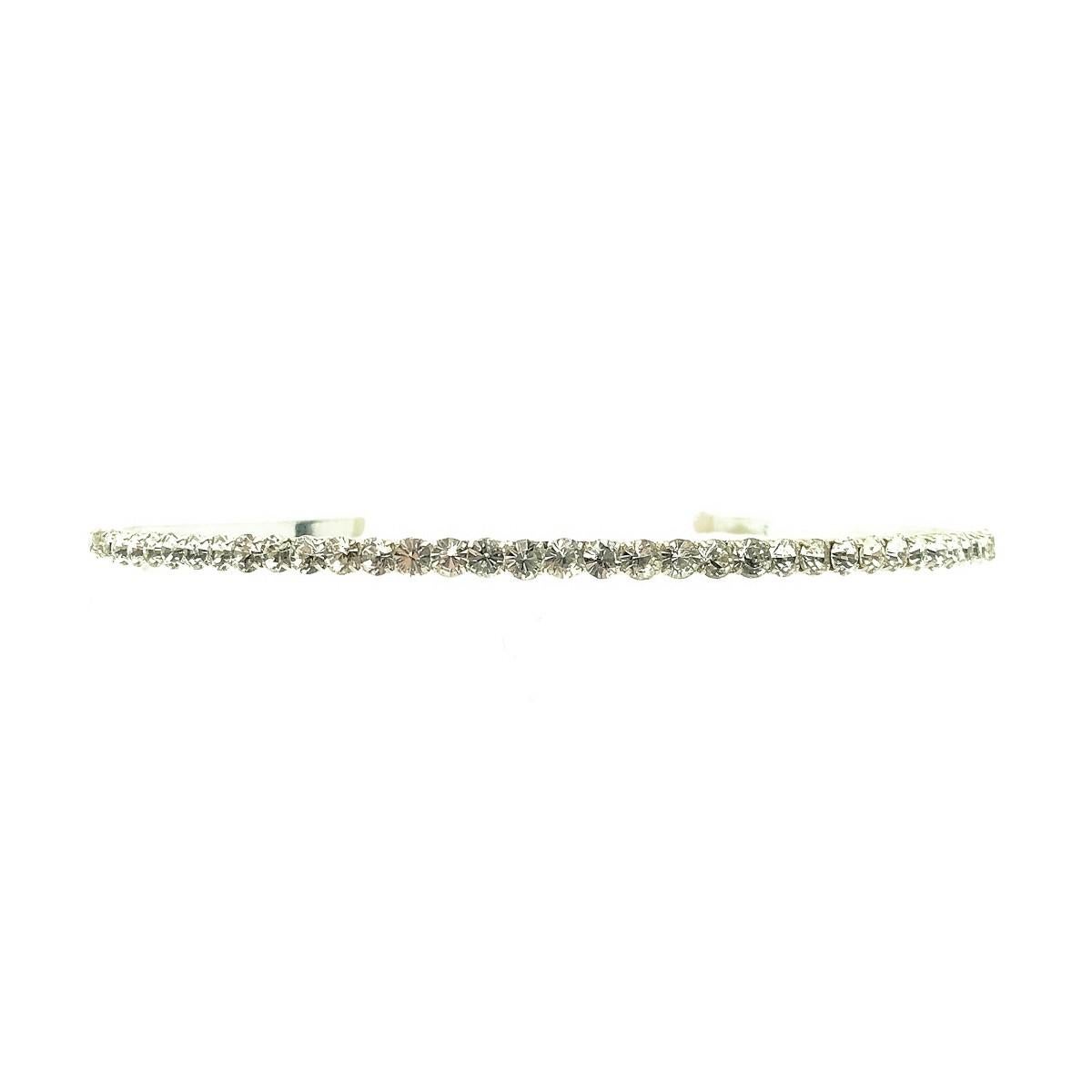 Vintage Silver & Crystal Line Hairband Tiara from the 1980s. Crafted in silver tone metal and claw set crystal stones. Enjoy the age old tradition on your wedding day with this emblem that signifies the crowning of love. In very good vintage