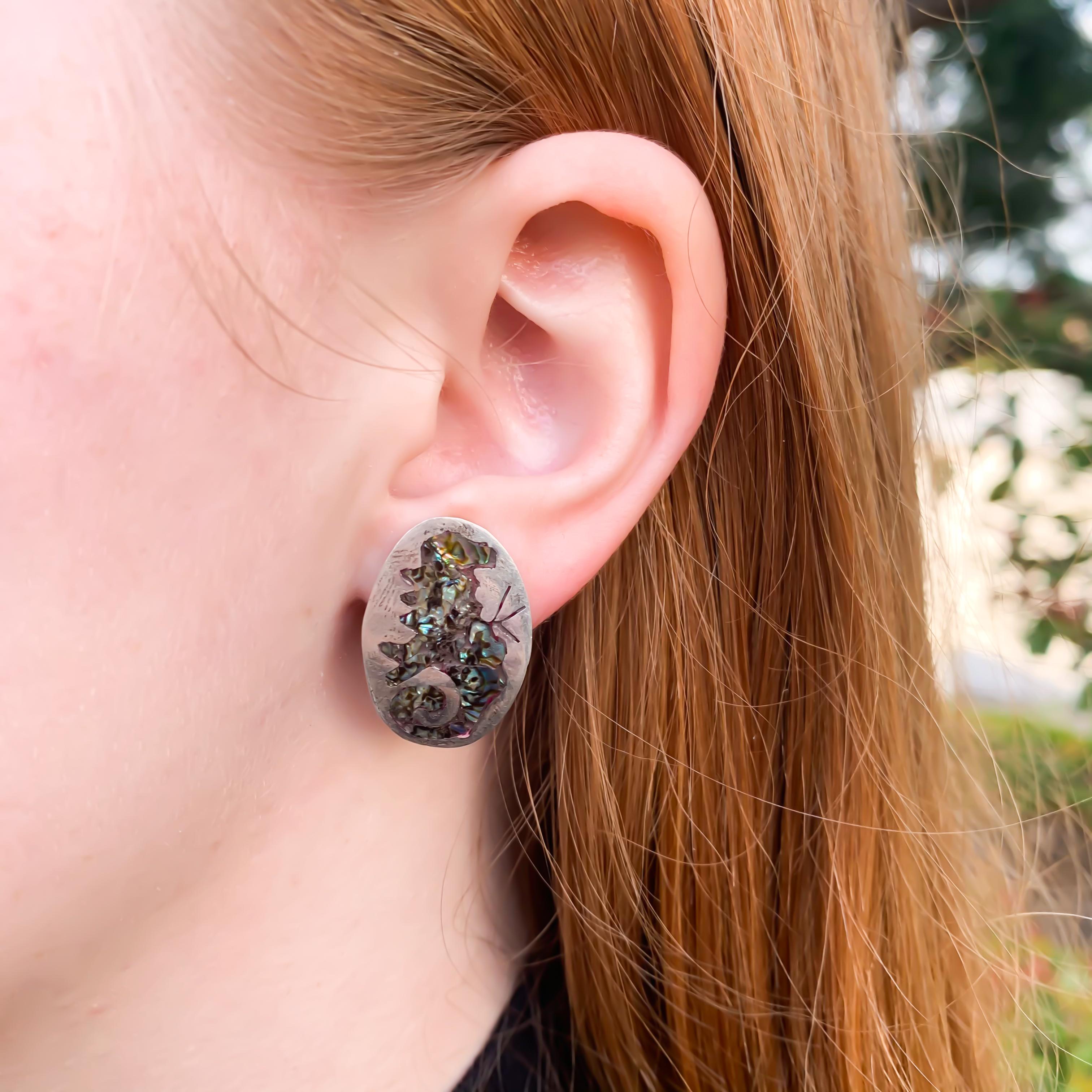 Vintage
Silver with Abalone Shell design/ cut-out. 
Earring Pair