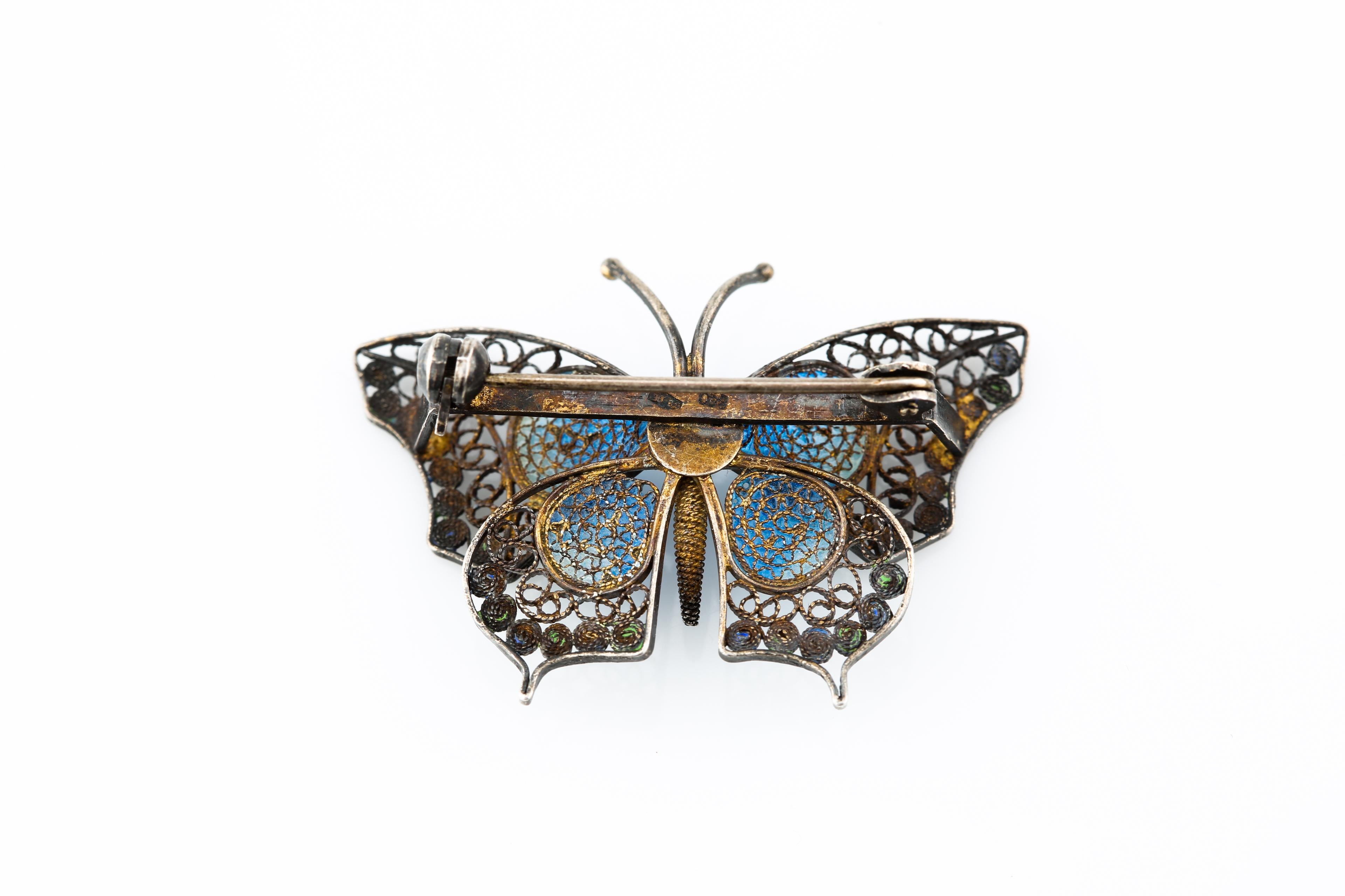 Vintage silver blue, green and white butterfly brooch
Designed by Alioto Adriana of Genova, Italy
Hallmarks: 