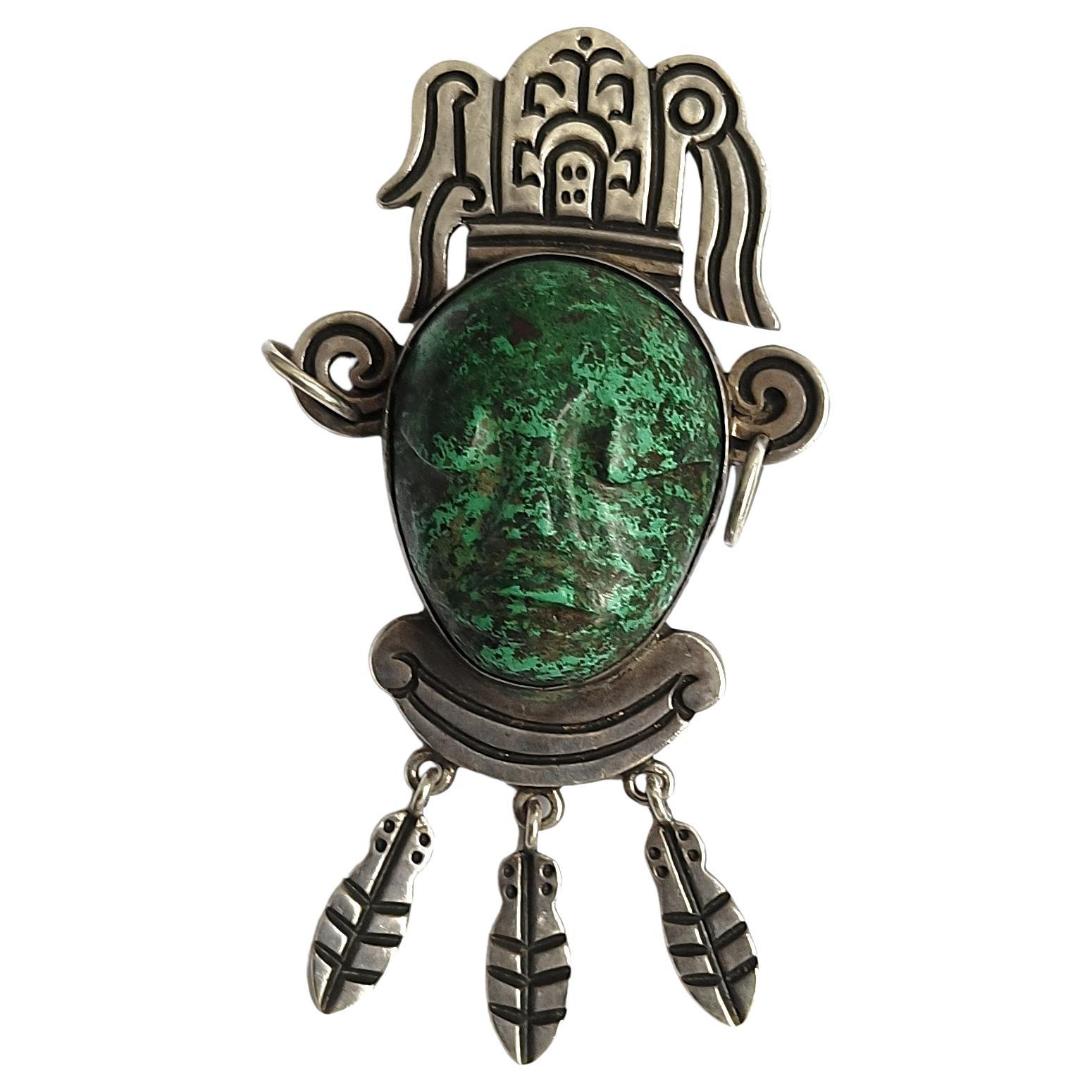 Spilla d'epoca in argento con pietra verde dal design azteco Taxco Mexico