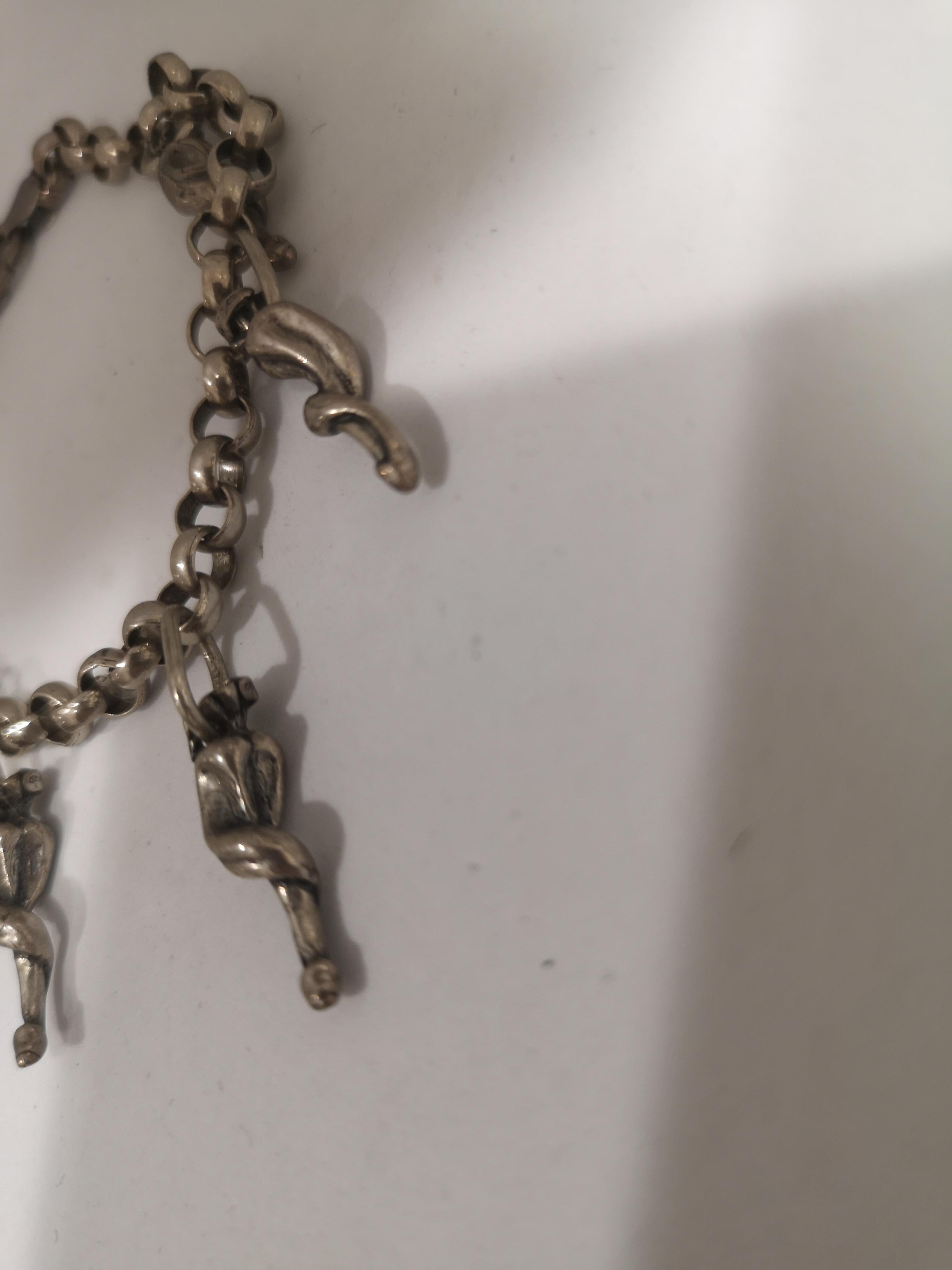 Bracelet breloques porte-bonheur vintage en corne d'argent Unisexe en vente
