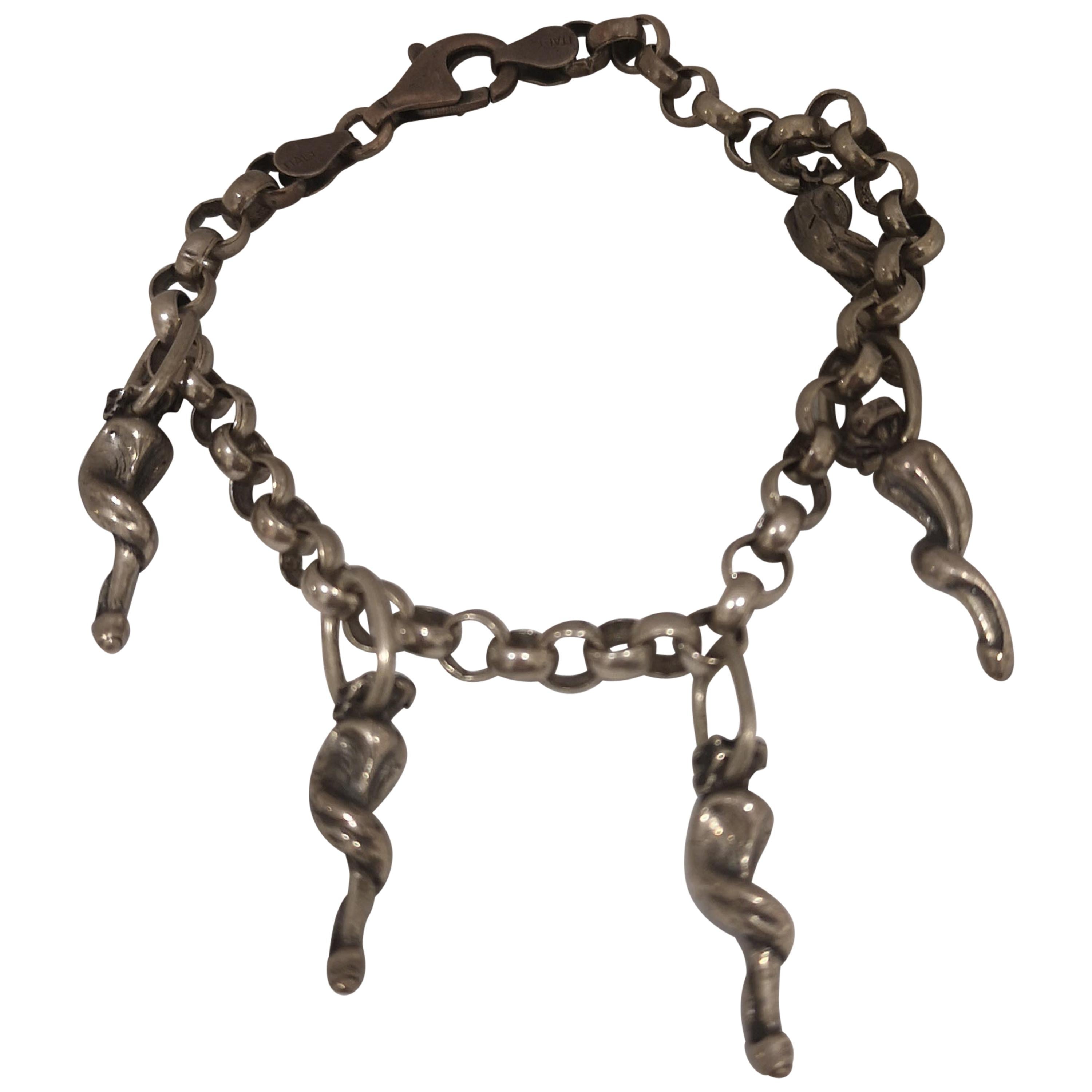 Bracelet breloques porte-bonheur vintage en corne d'argent en vente